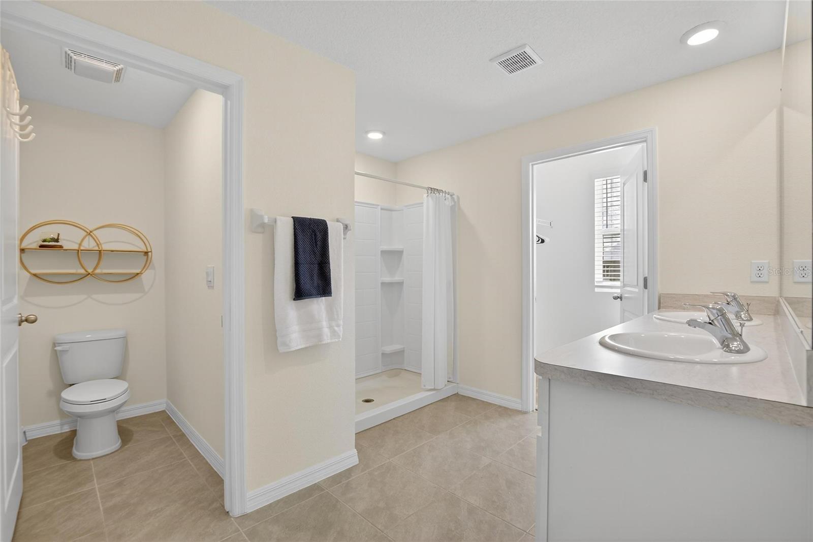 7751 ROSEWOOD GARDEN LOOP