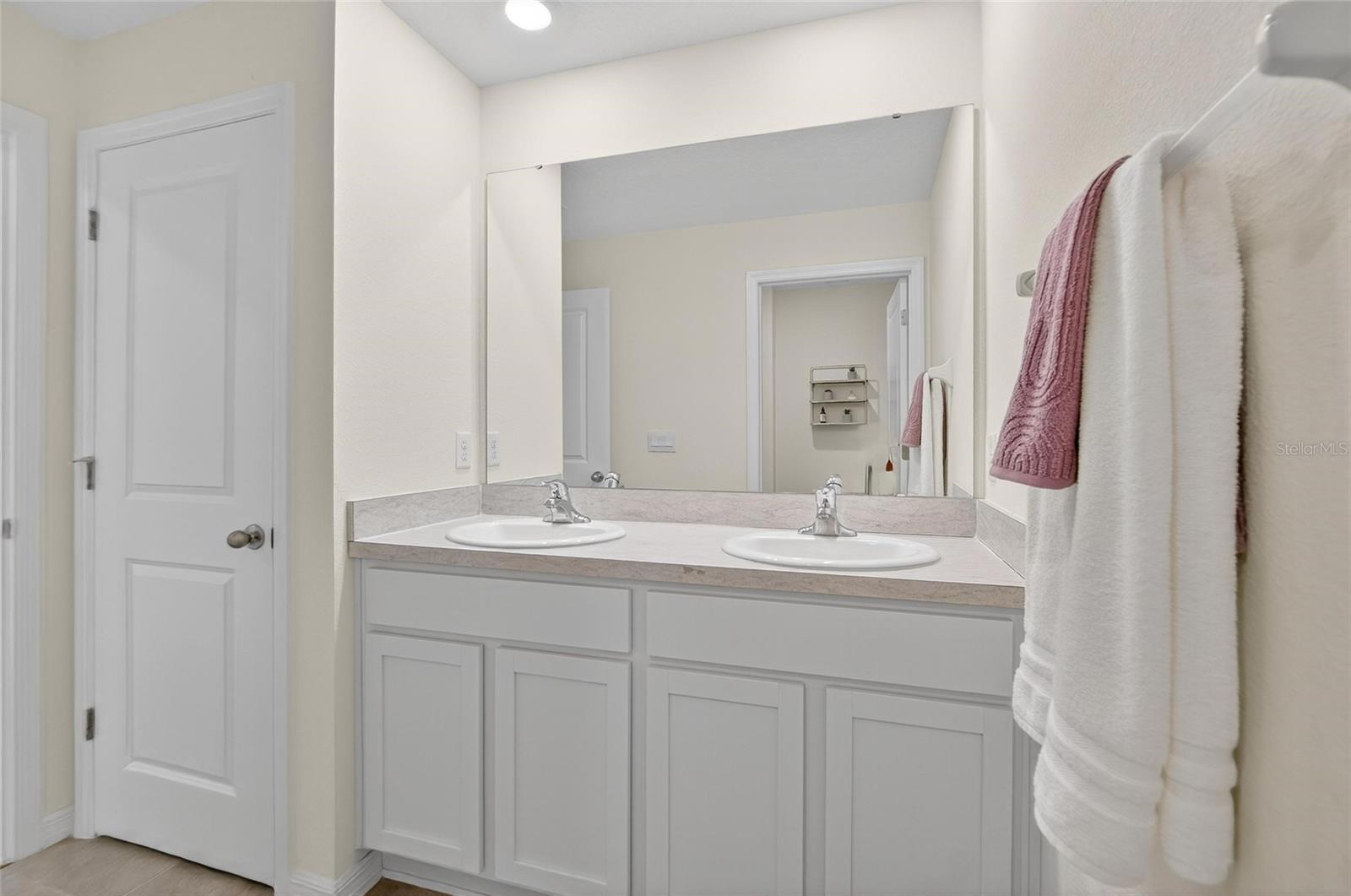 7751 ROSEWOOD GARDEN LOOP