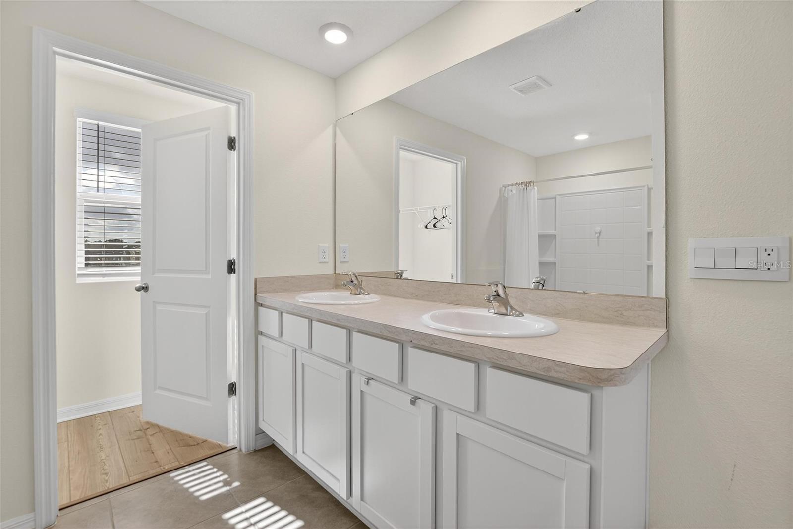 7751 ROSEWOOD GARDEN LOOP