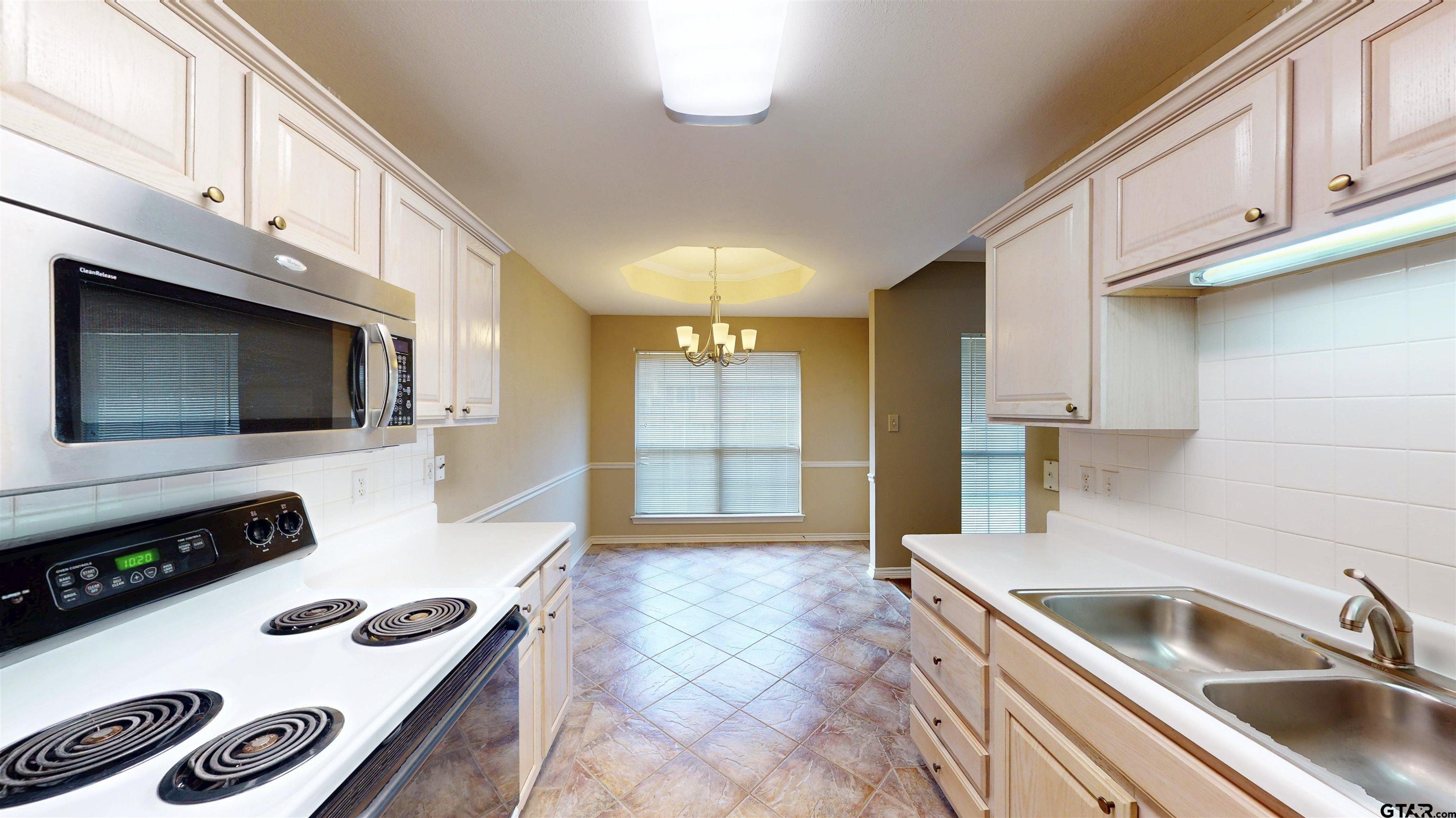 5401 Hollytree Dr #1002