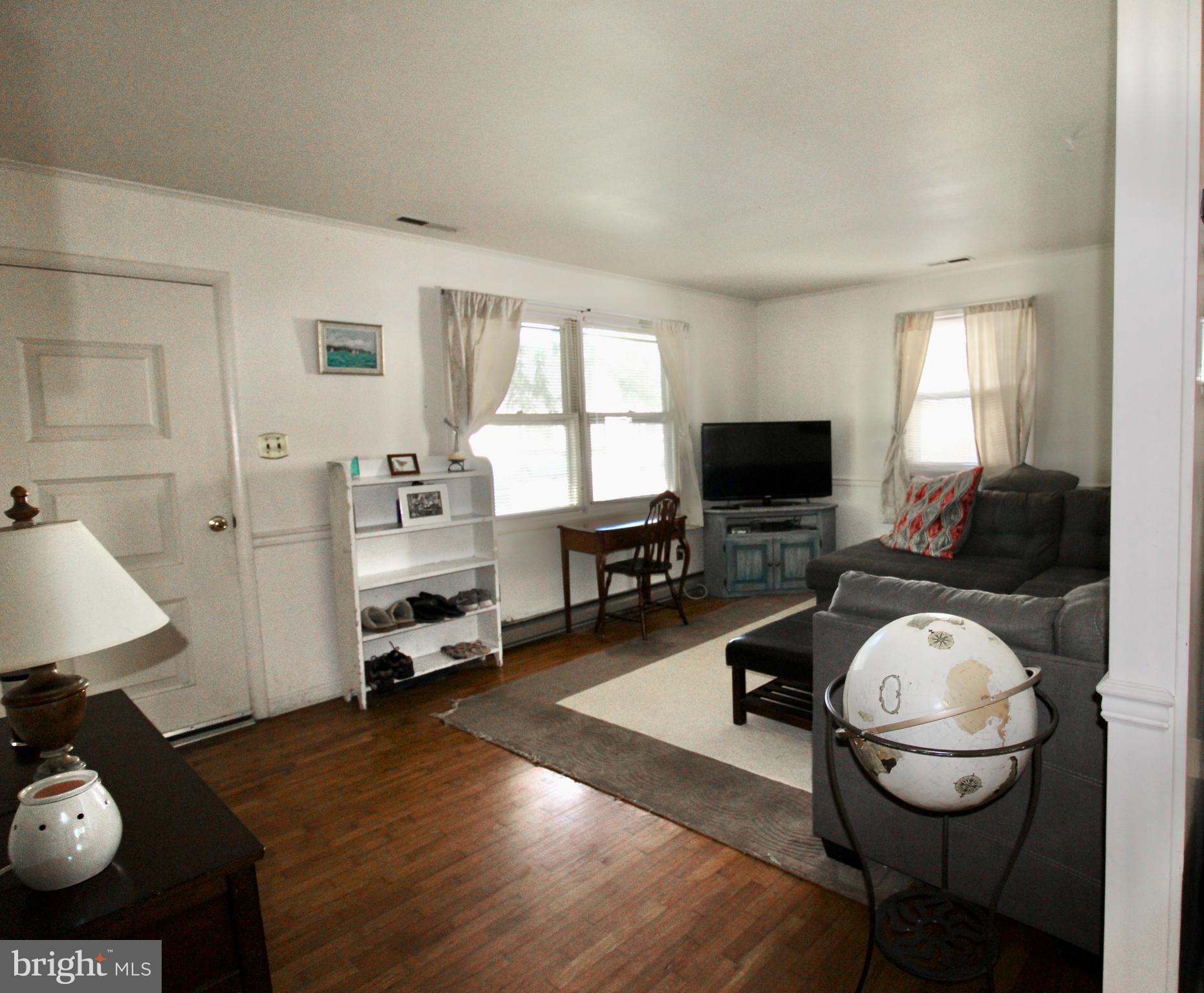 107 E MAPLE AVENUE