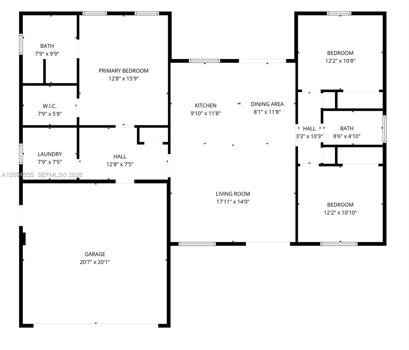 Floor plan showing three bedrooms, two bathrooms, living room, kitchen, laundry, and garage.