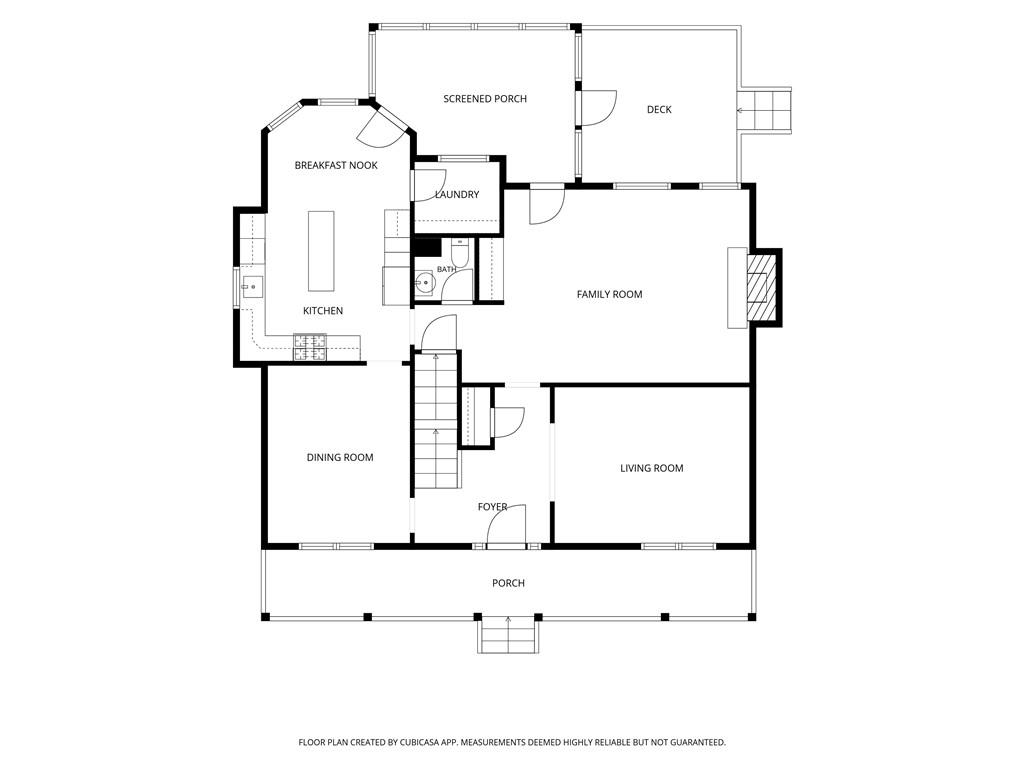 Main-level floor plan with kitchen, dining and living rooms, family room, porches, and deck.
