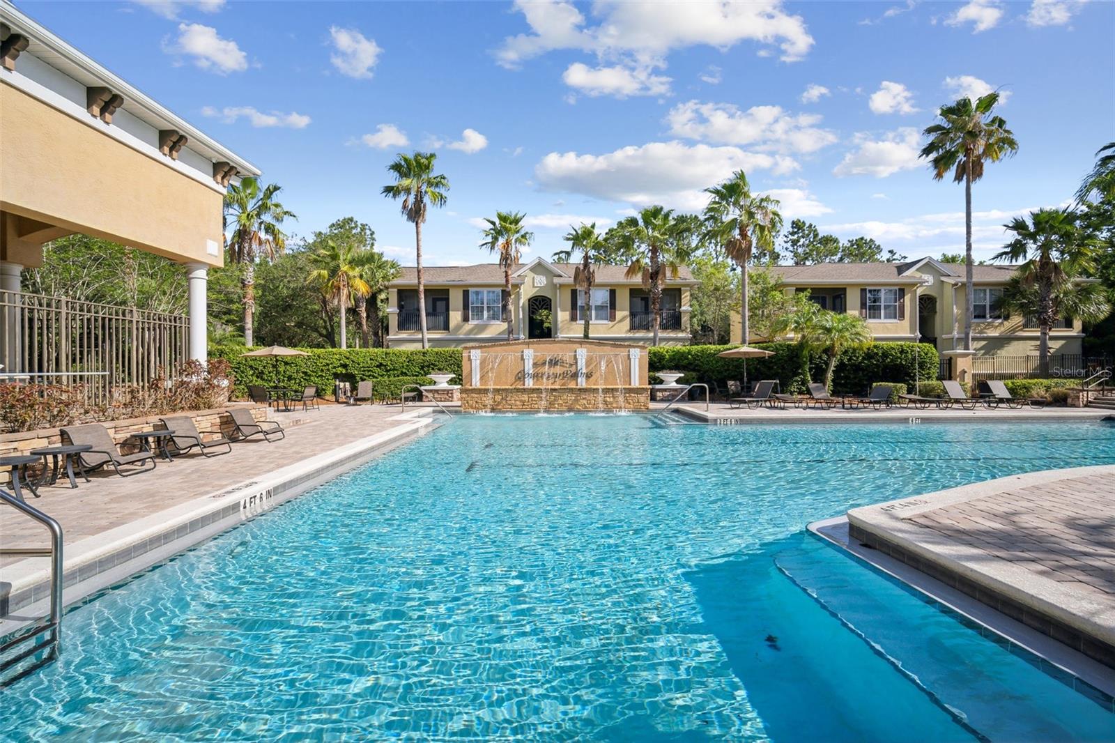 10019 COURTNEY PALMS BLVD #203