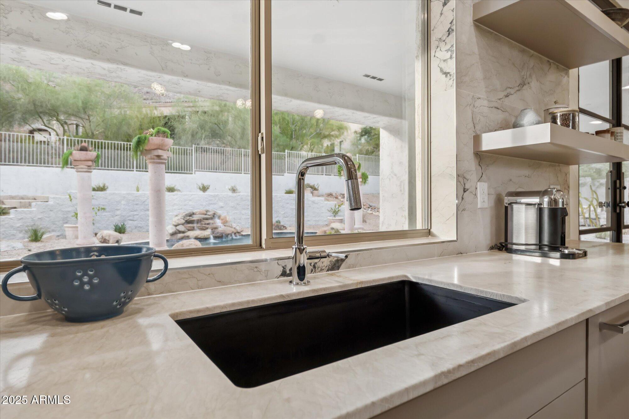 11446 E SWEETWATER Avenue