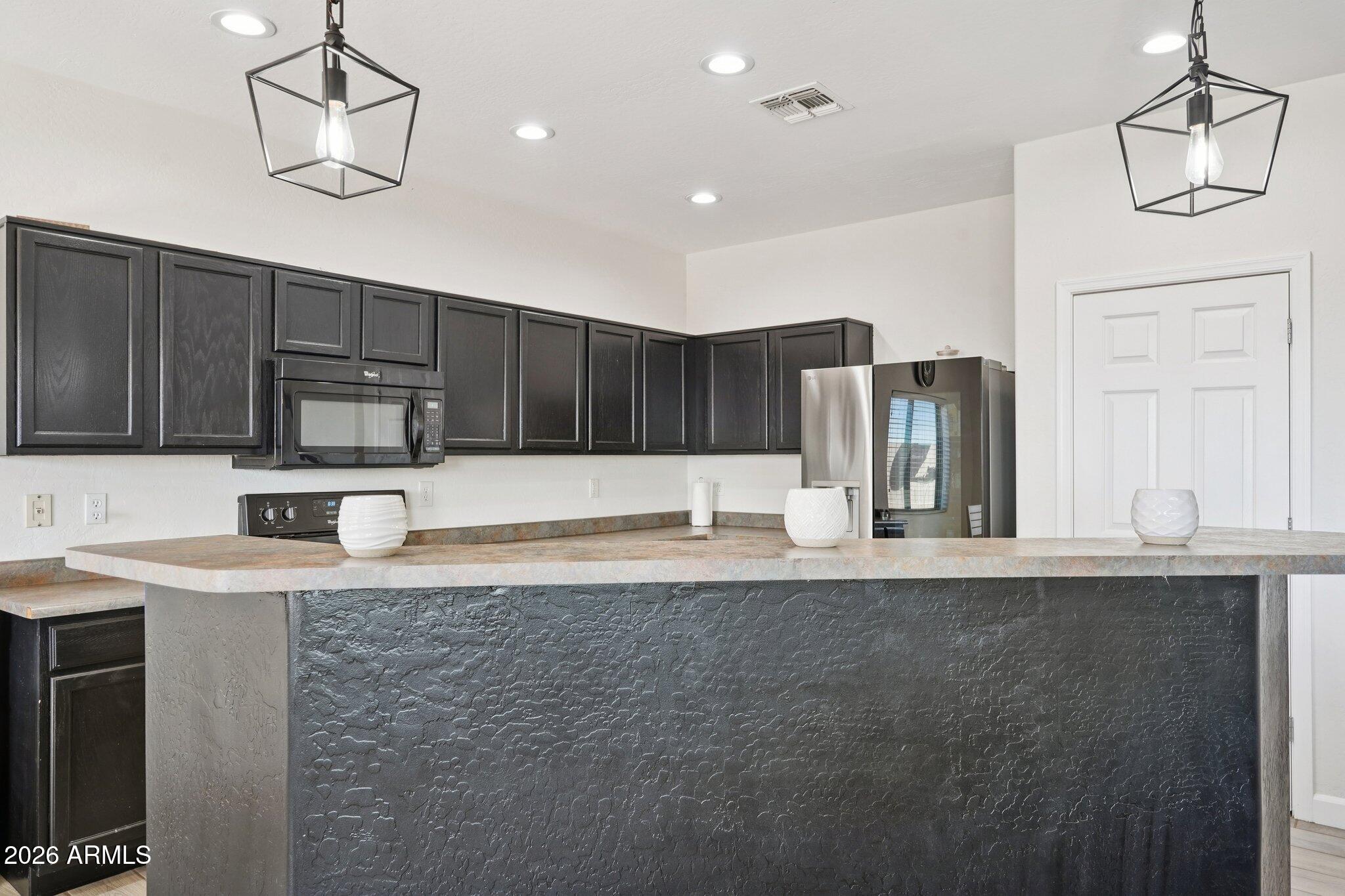 24443 W PUEBLO Avenue