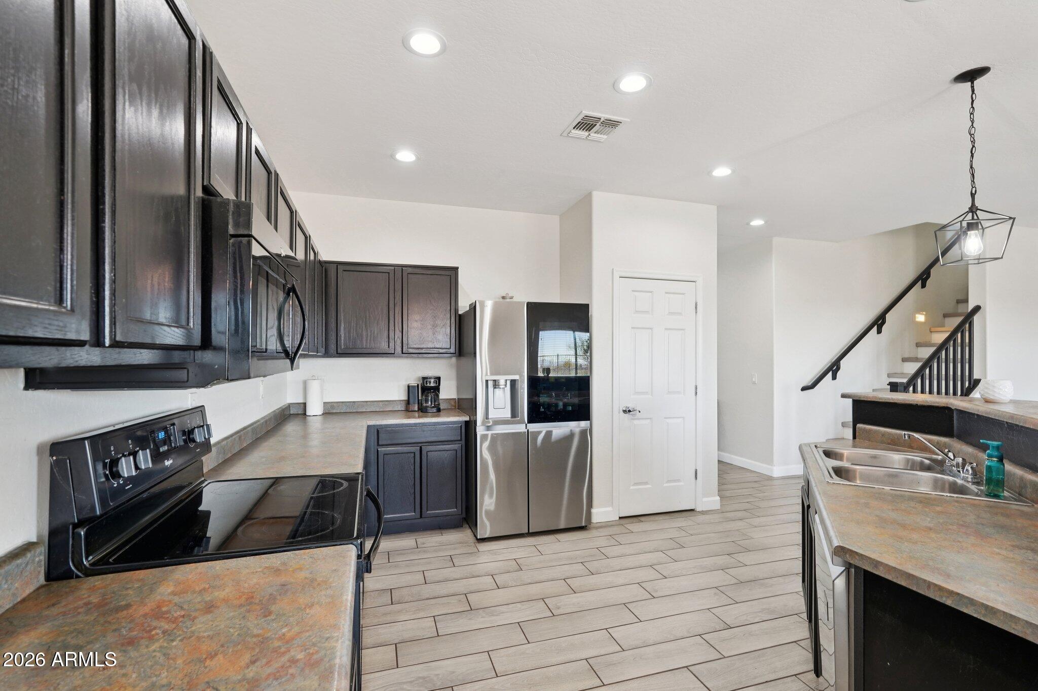 24443 W PUEBLO Avenue