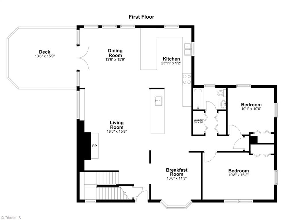 First-floor plan with an open living and dining area, kitchen, deck, breakfast room, and two bedrooms.