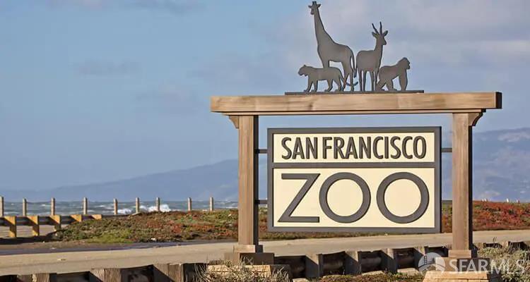 San Francisco Zoo entrance sign topped with animal silhouettes.