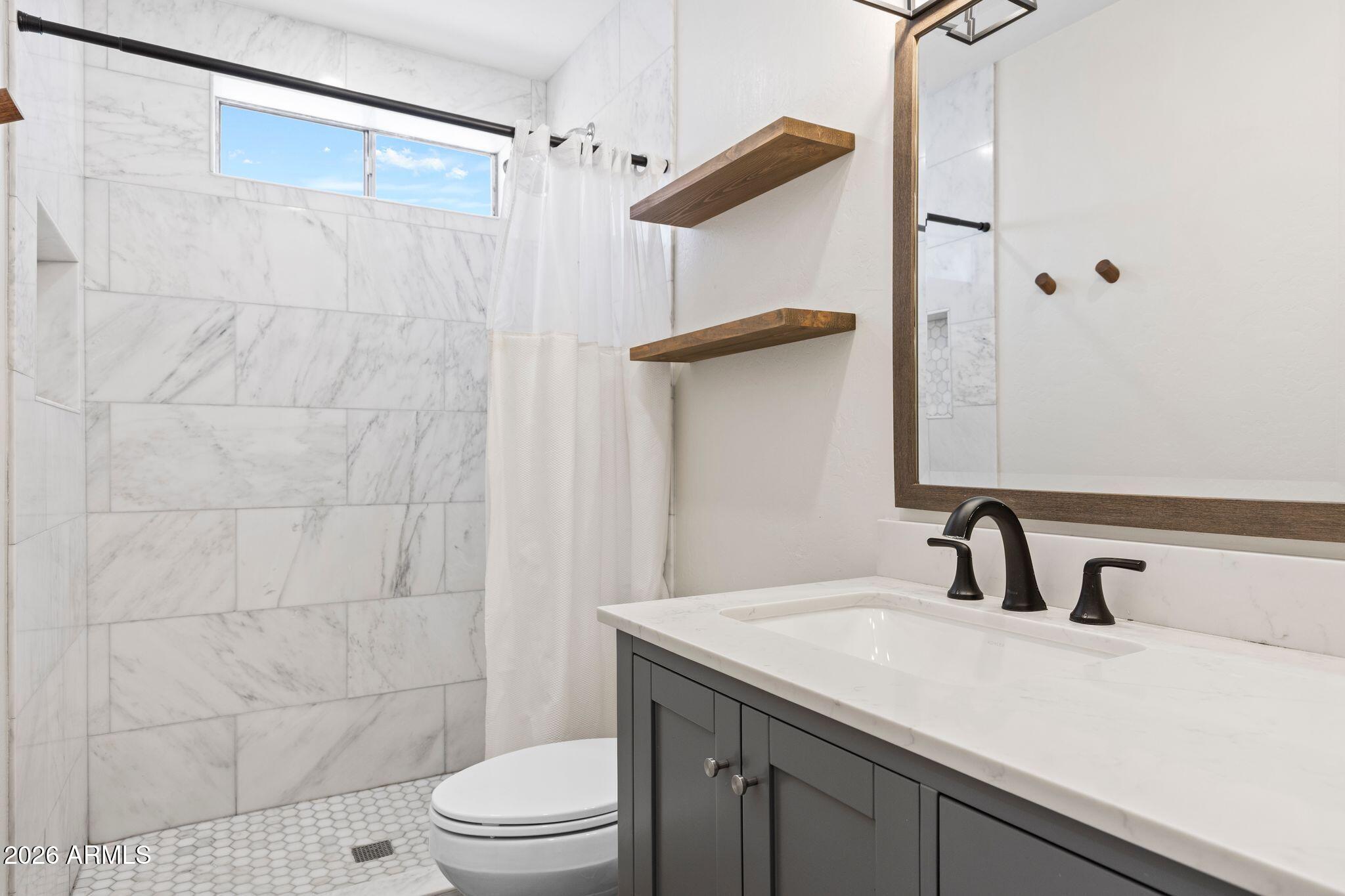 8525 E BONNIE ROSE Avenue