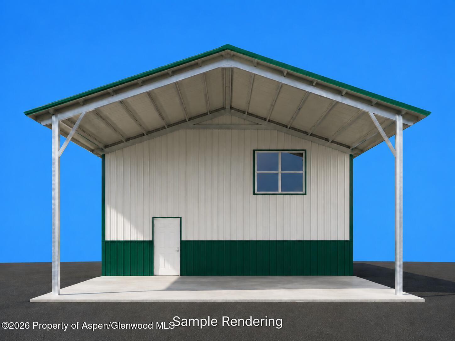 Rendered metal outbuilding with a wide covered concrete apron, front window, and door.