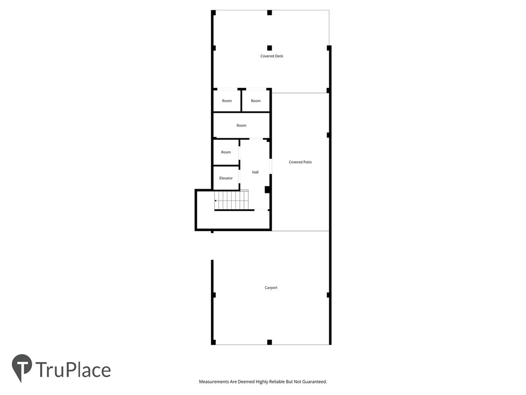 Floor plan with several rooms, an elevator, covered deck, covered patio, and carport.