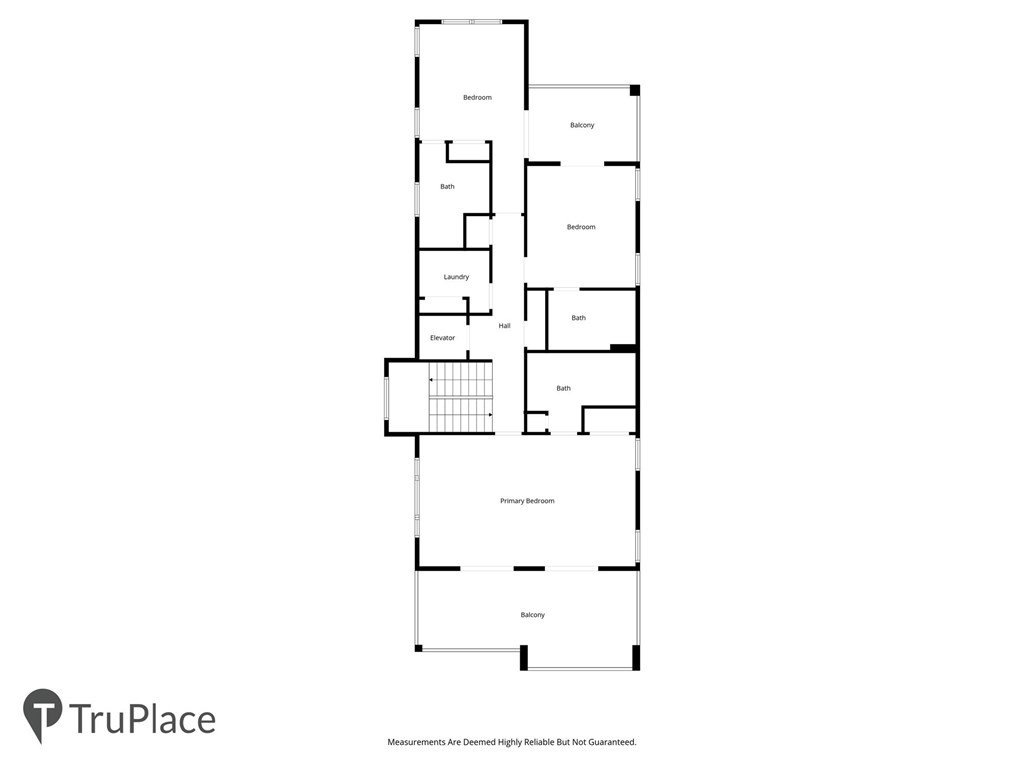 Floor plan with three bedrooms, three bathrooms, an elevator, laundry room, and two balconies.