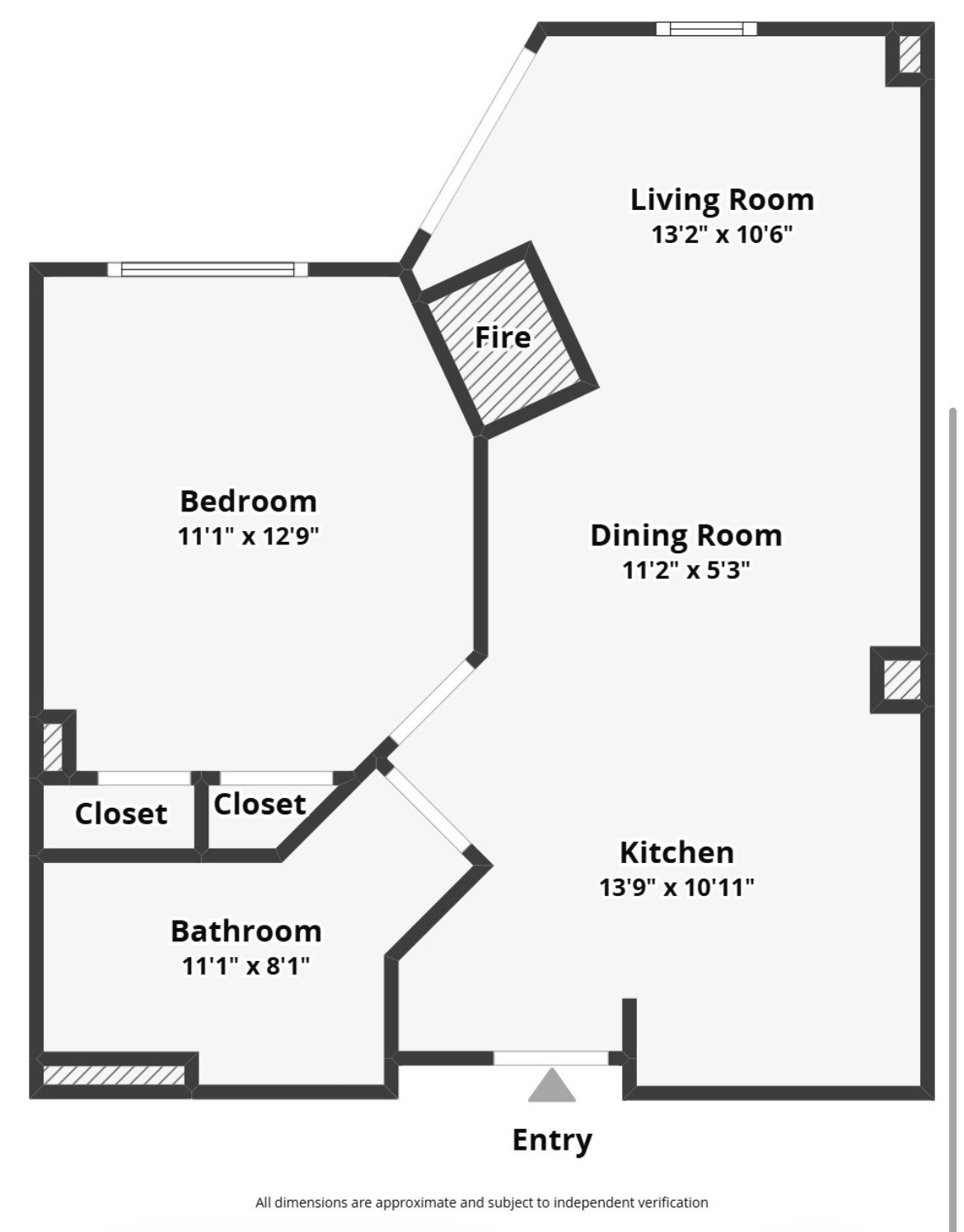 Floor plan showing a bedroom, bathroom, kitchen, dining room, living room, fireplace, closets, and entry.