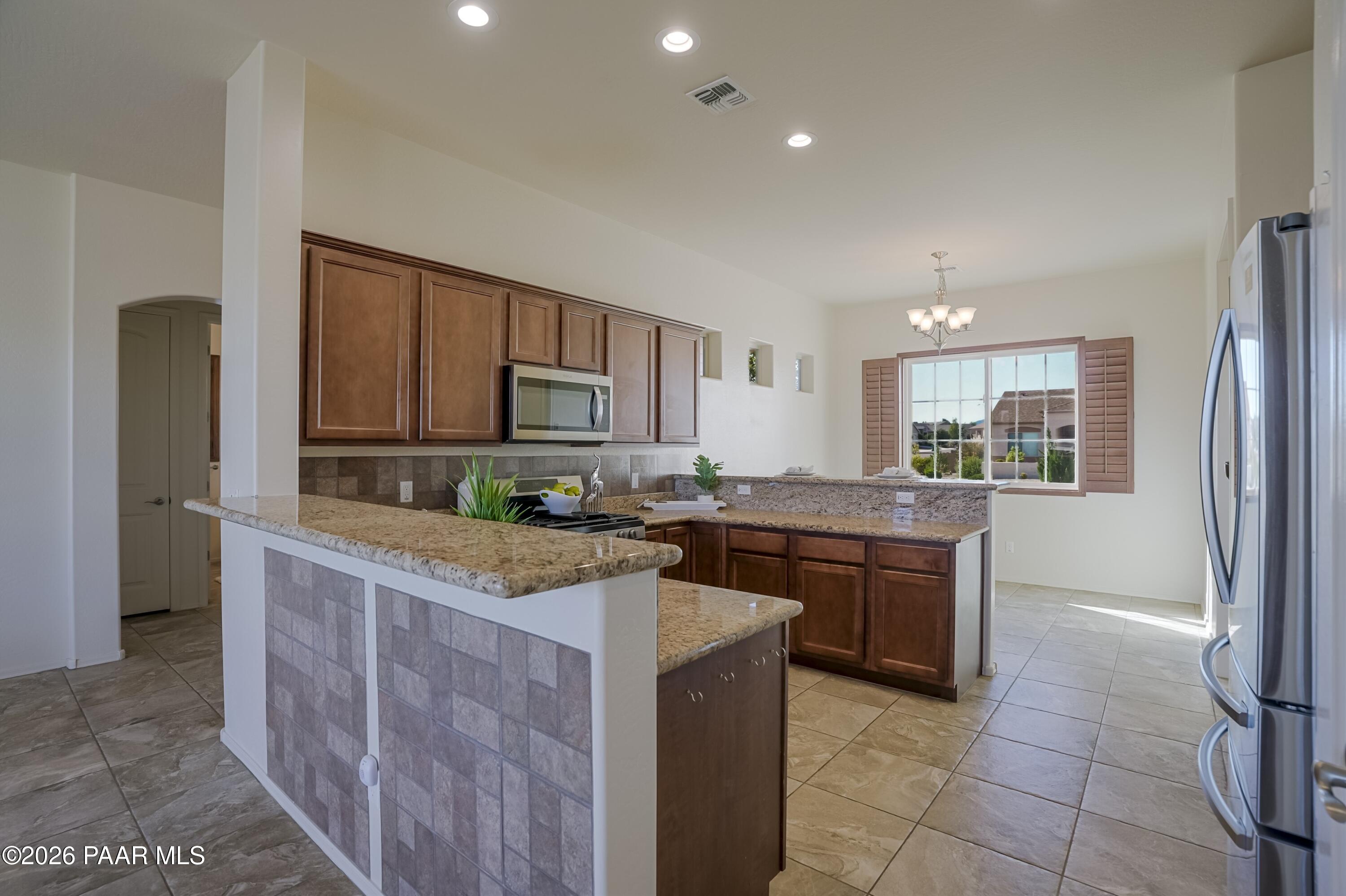 6228 E Garnet Place