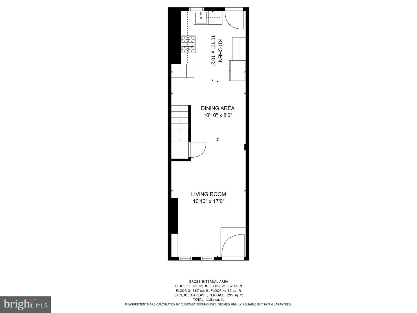 First-floor plan with a kitchen, dining area, living room, and staircase.