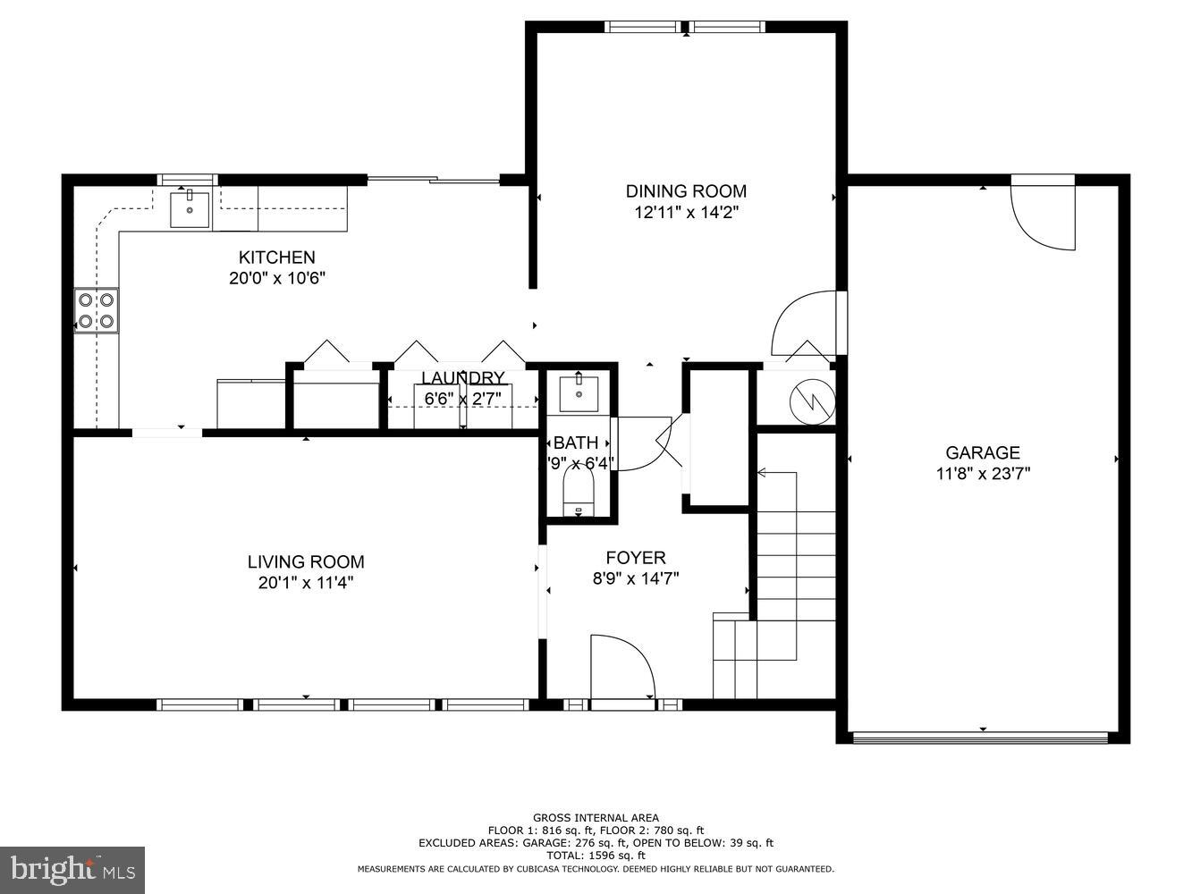 Floor plan showing the kitchen, dining and living rooms, foyer, bath, laundry, and garage with room dimensions.
