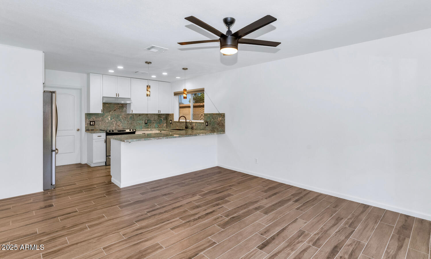 10590 E MERCER Lane