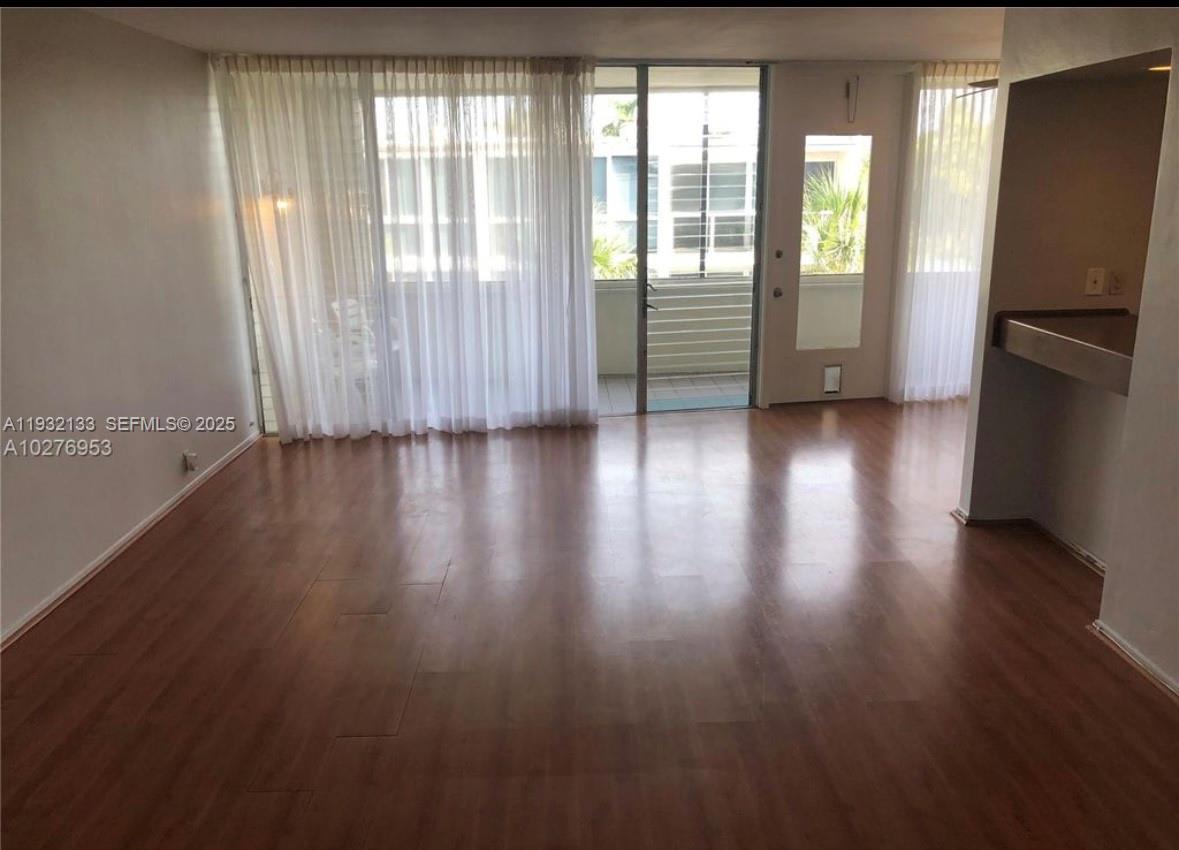 10210 Collins Ave # 306