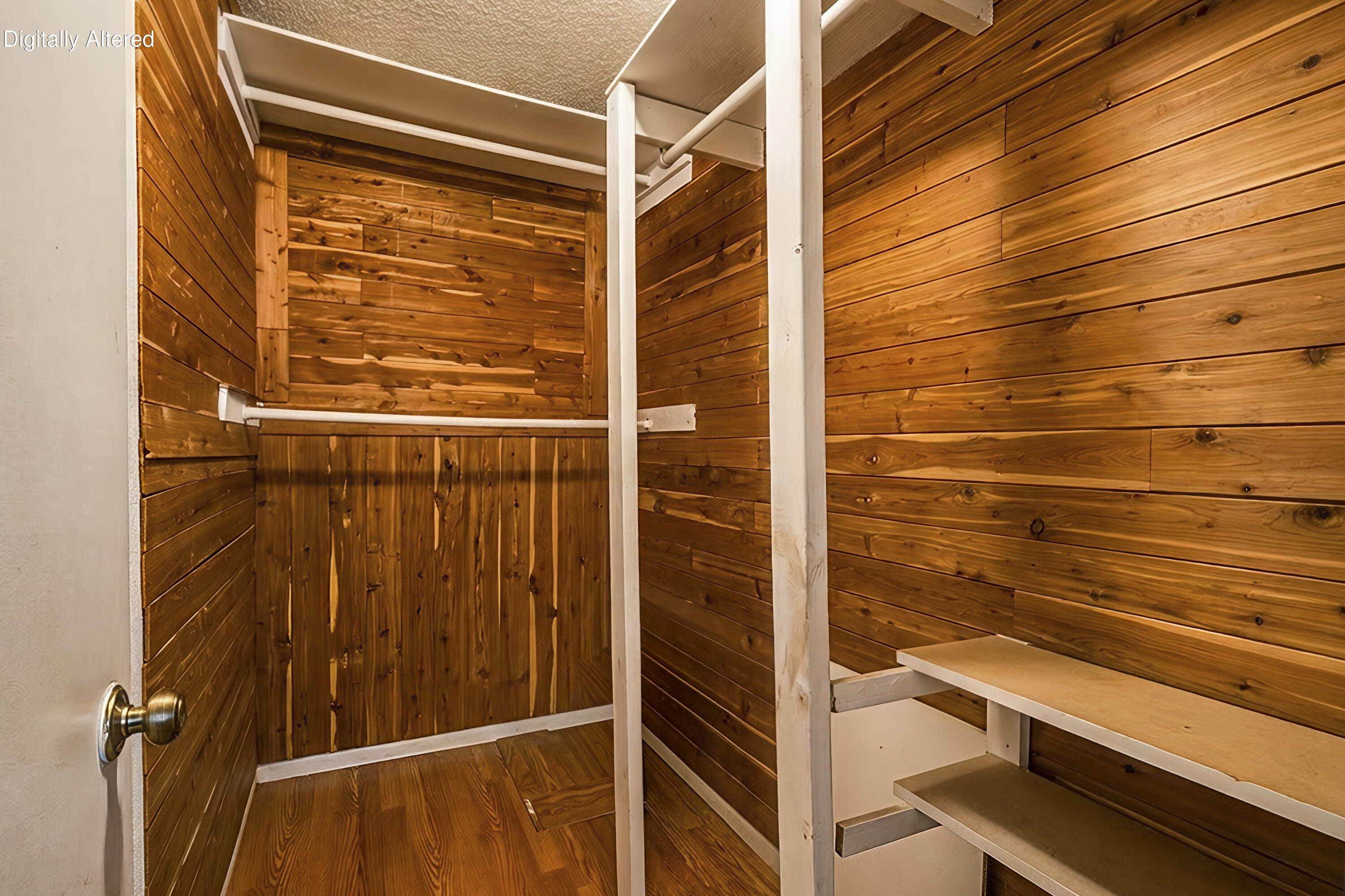 Cedar-lined closet with a hanging rod and built-in shelves.