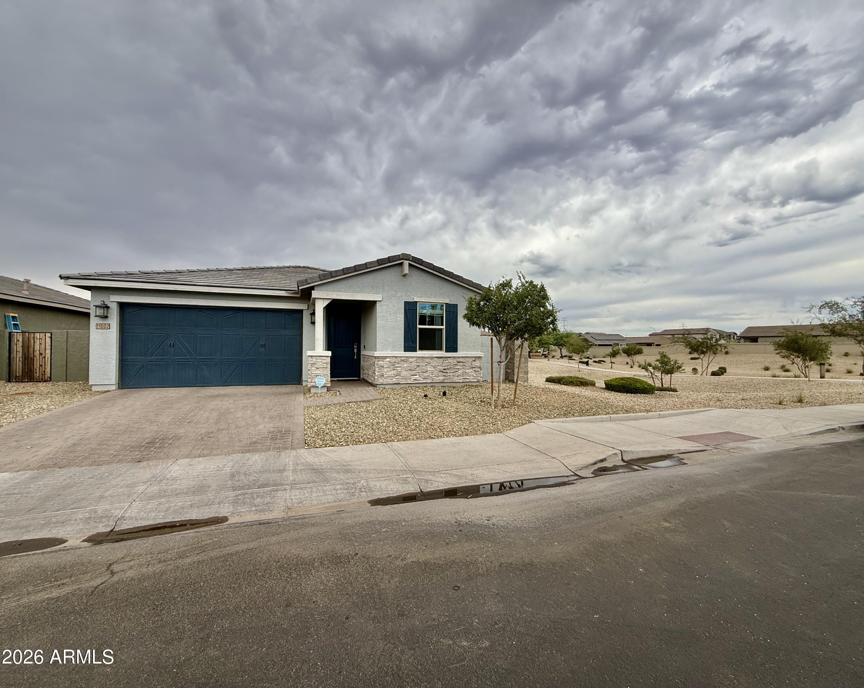 11002 W MARGUERITE Avenue