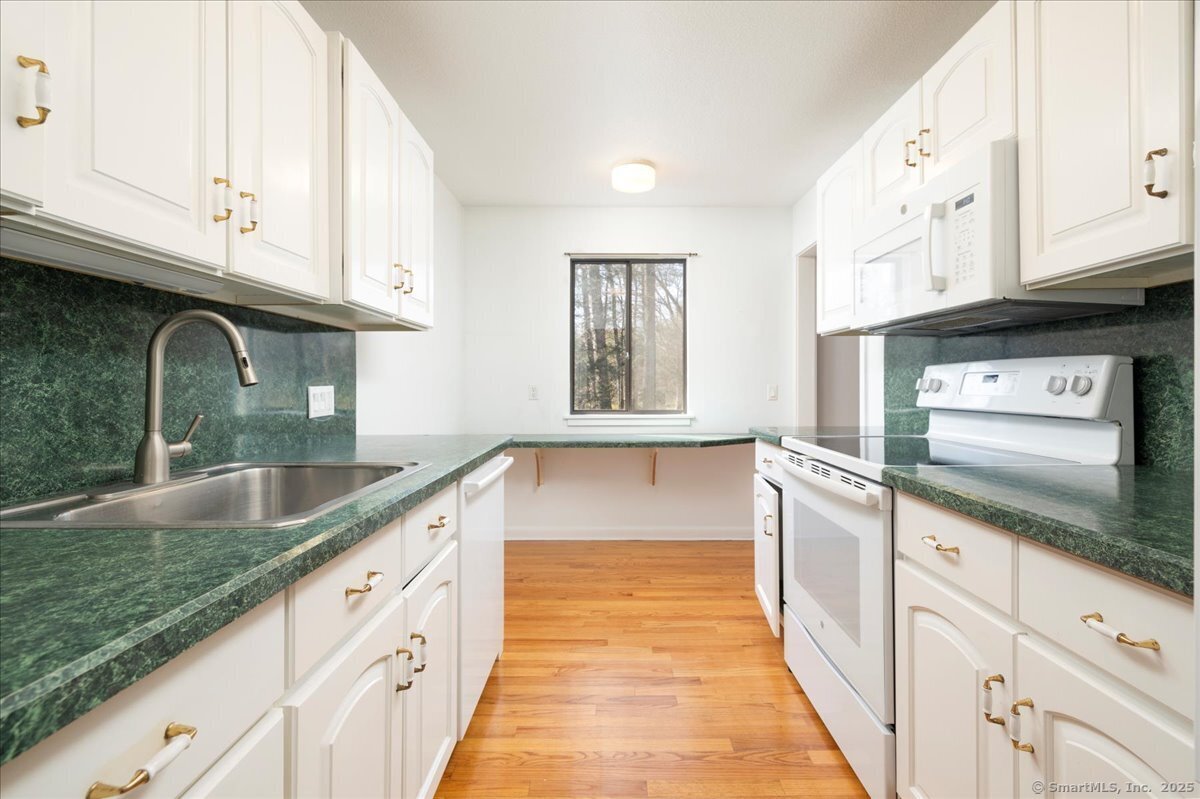 114 Heritage Village E