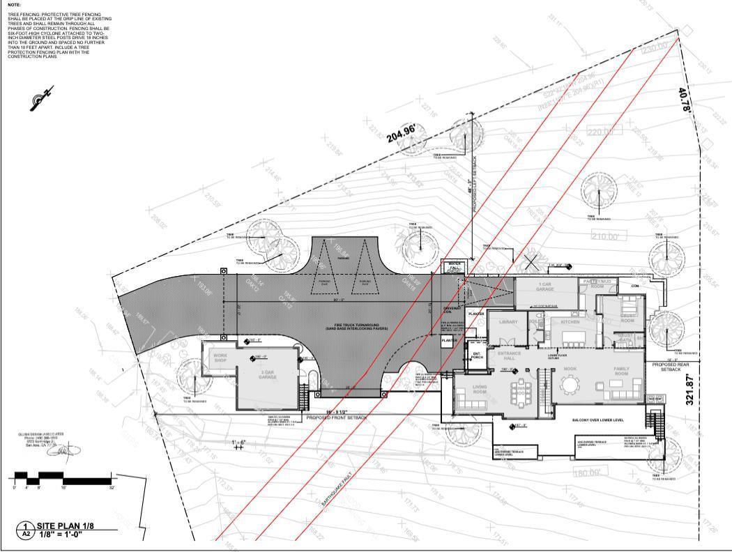 Architectural site plan showing a home layout, driveway, lot boundaries, trees, and setbacks.