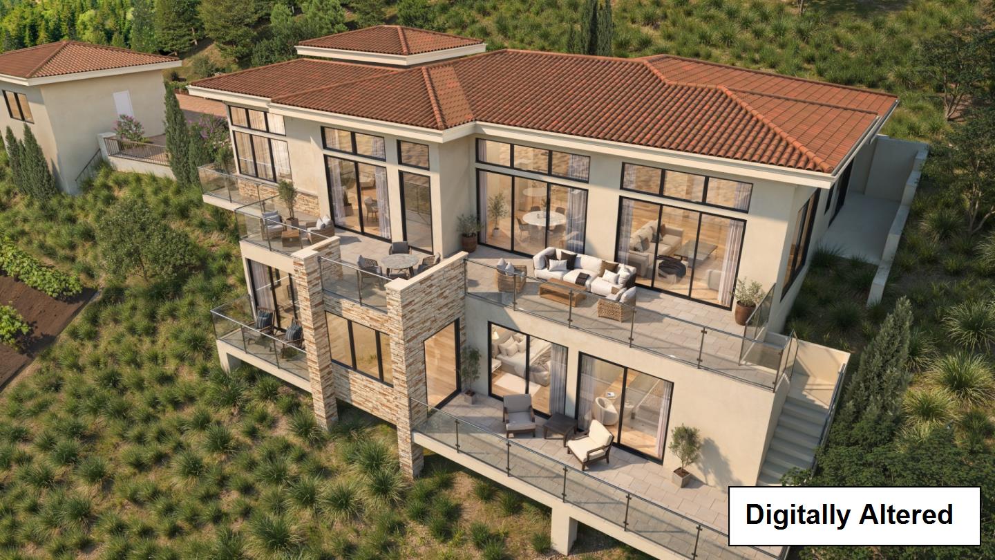 Modern multi-level home with a terracotta tile roof and expansive glass-railed balconies on a landscaped hillside.