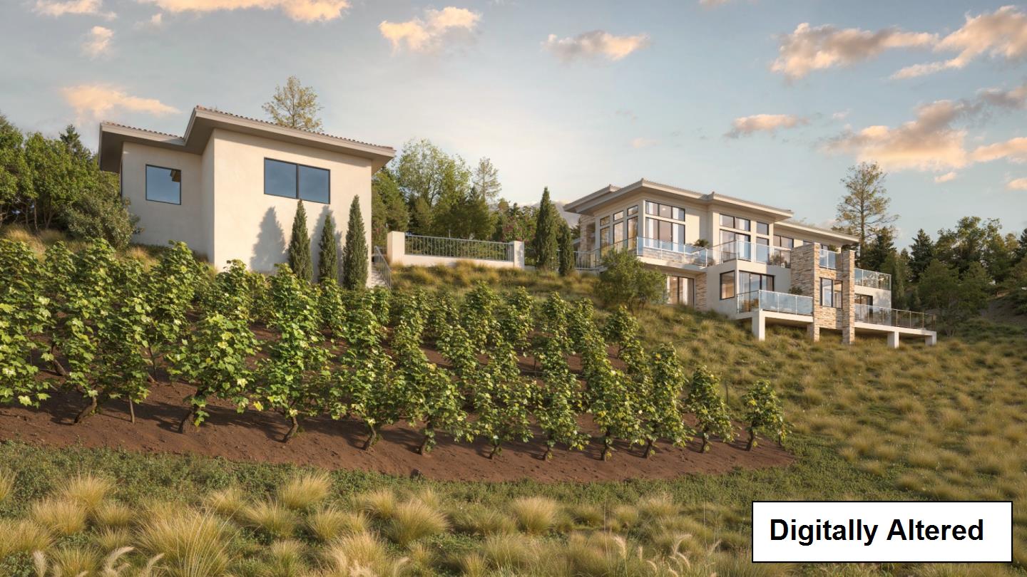 Modern hillside home above rows of grapevines, with a separate building nearby.