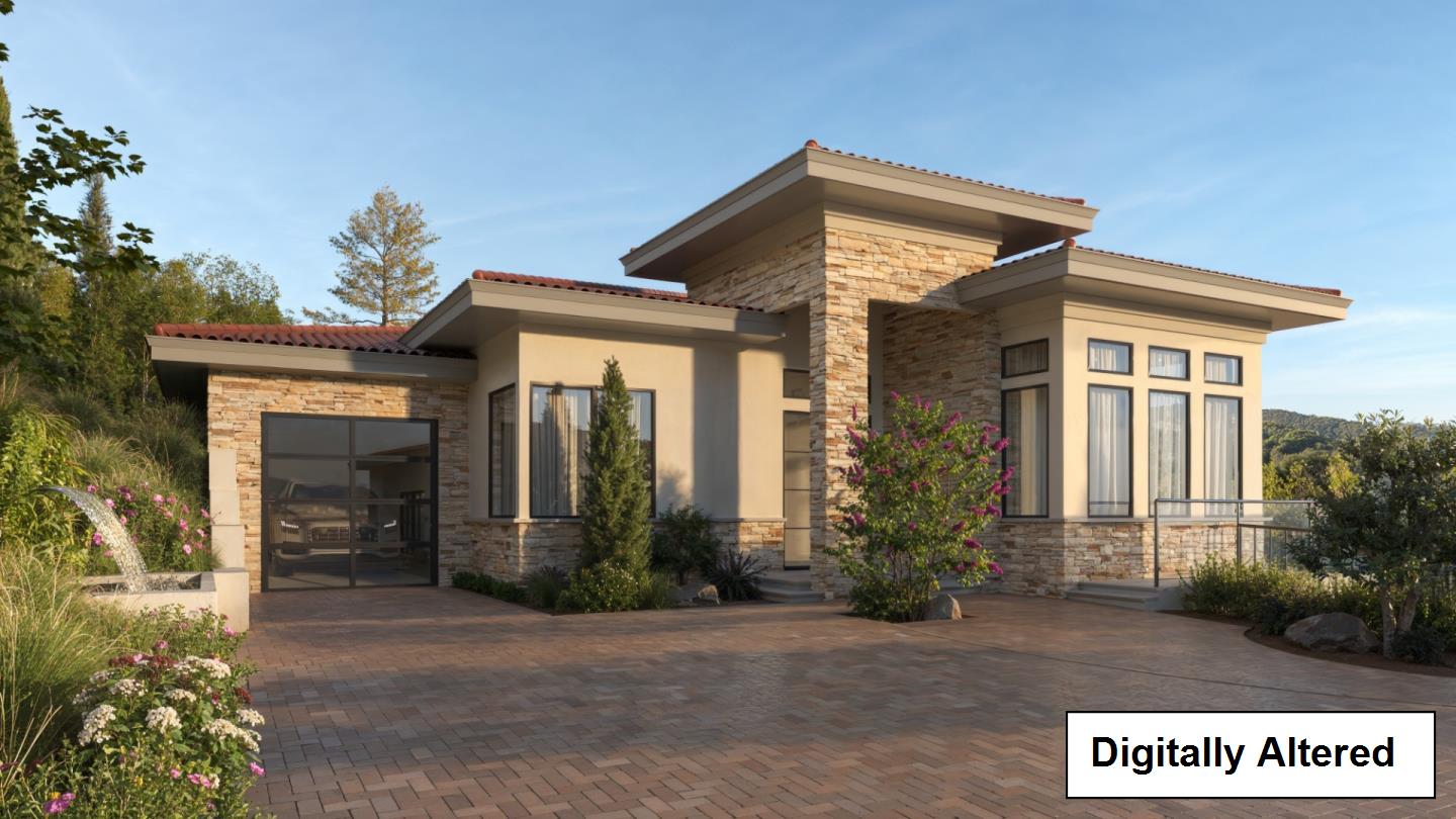 Modern stone-and-stucco home with a red tile roof, attached garage, and landscaped paved courtyard.