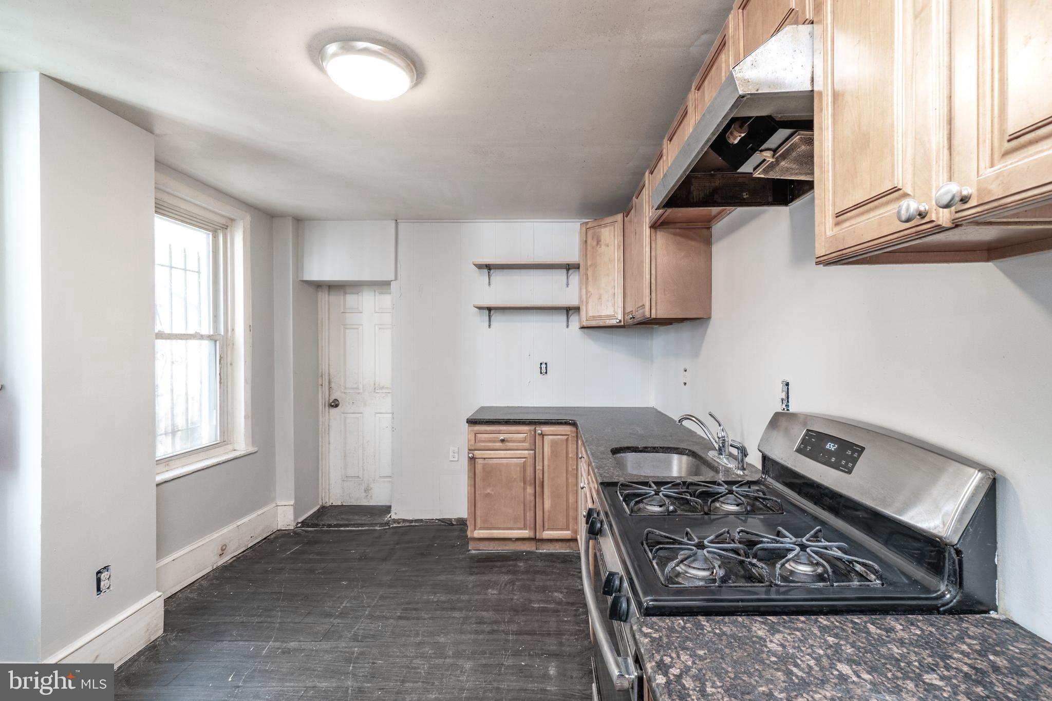 6064 W GIRARD AVE