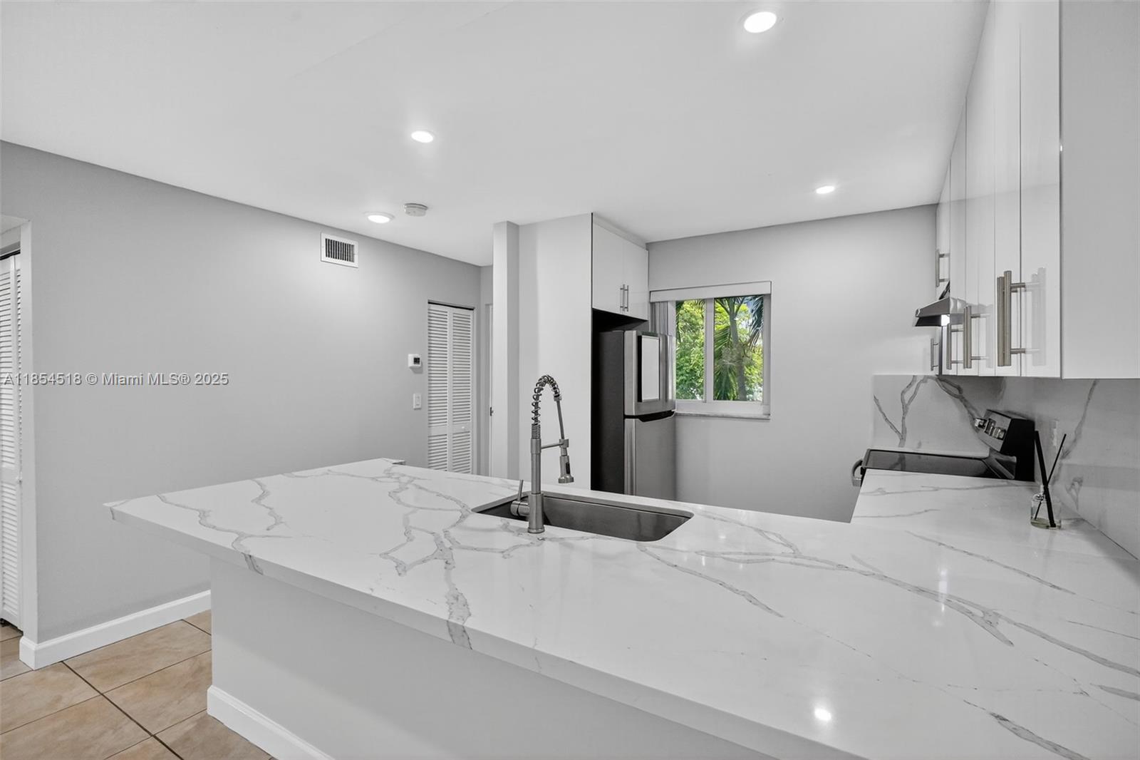 7705 Camino Real # B204