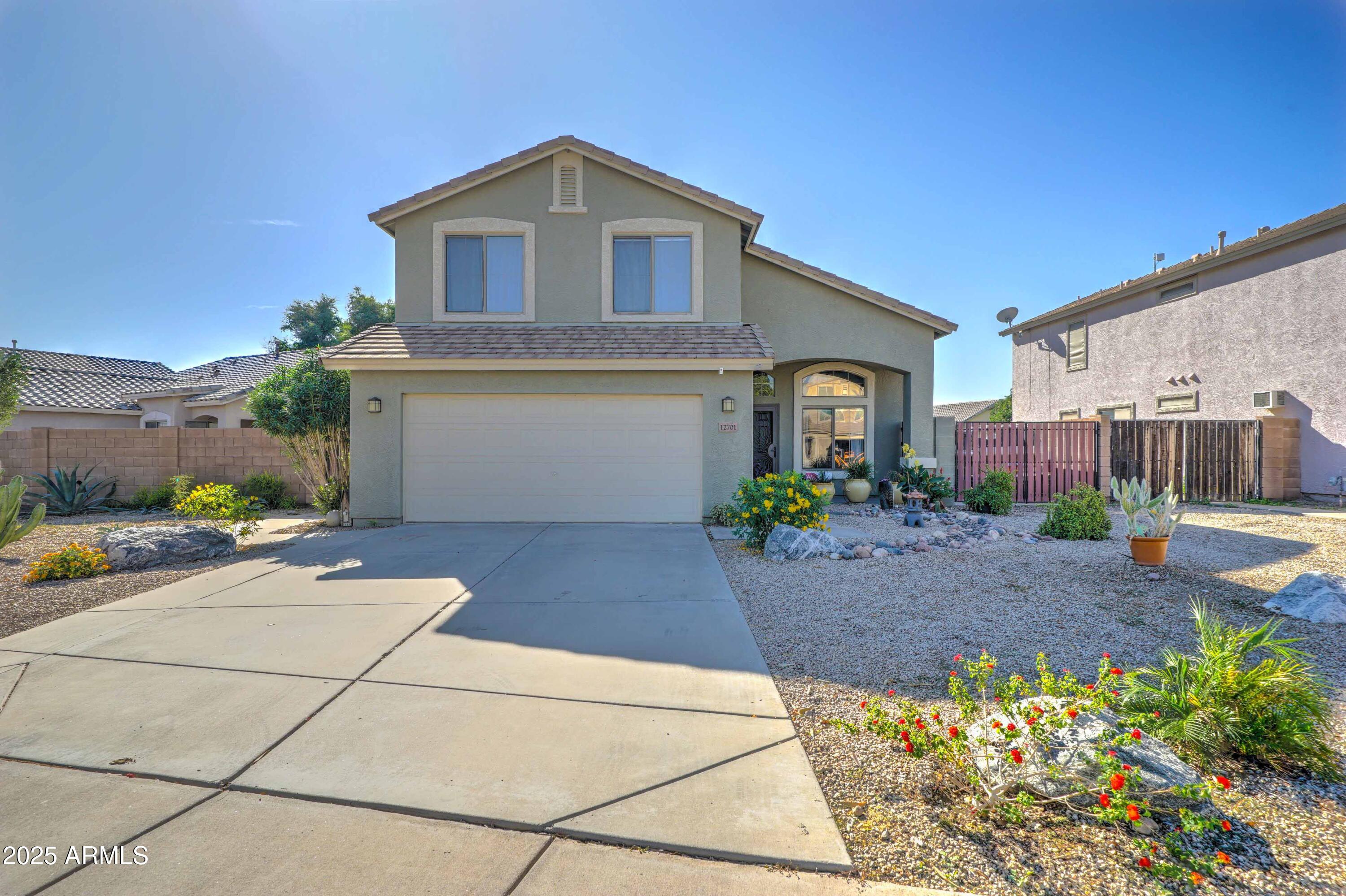 12701 W HOLLYHOCK Drive