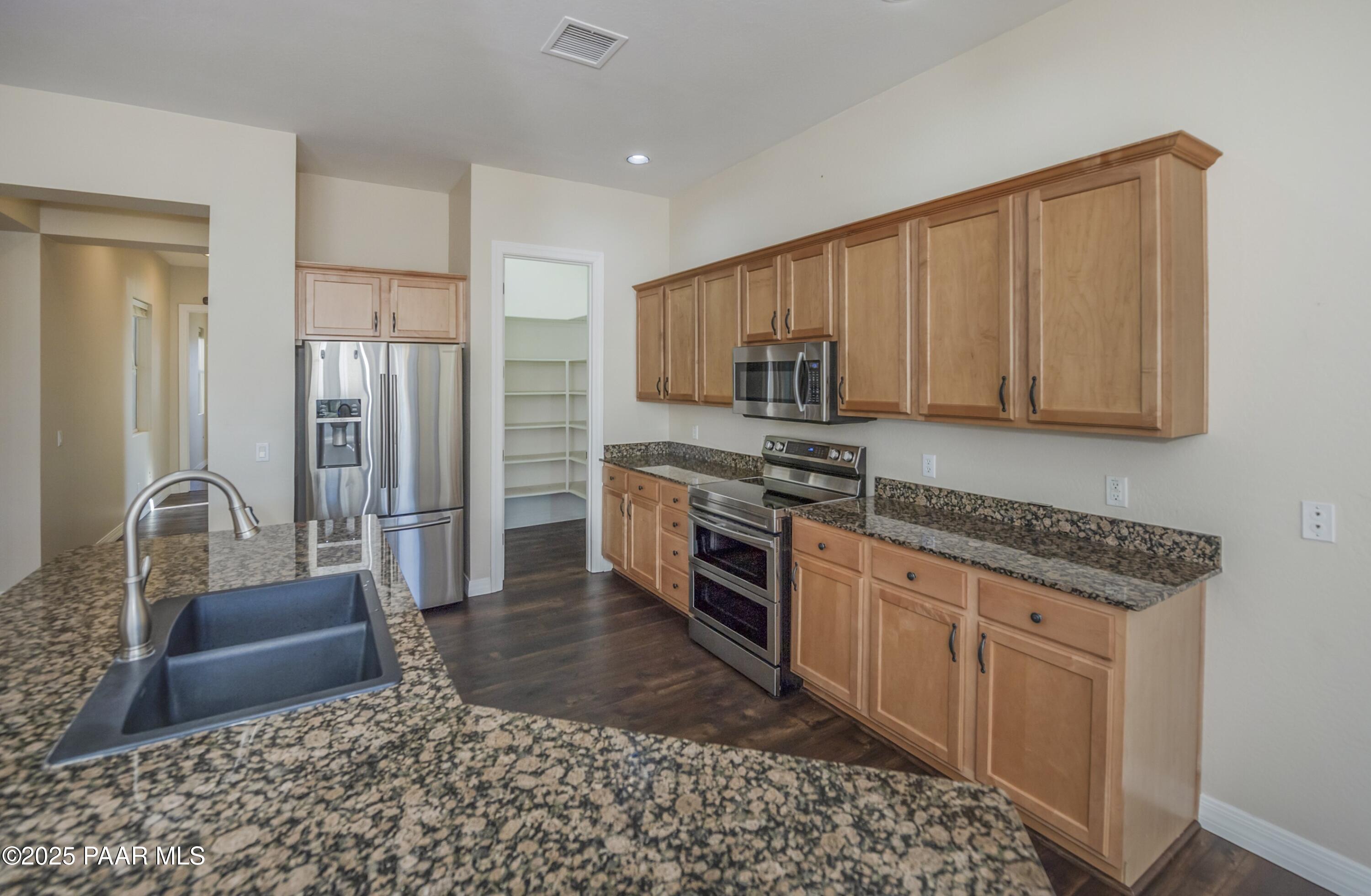 12824 E De La Cruz Street