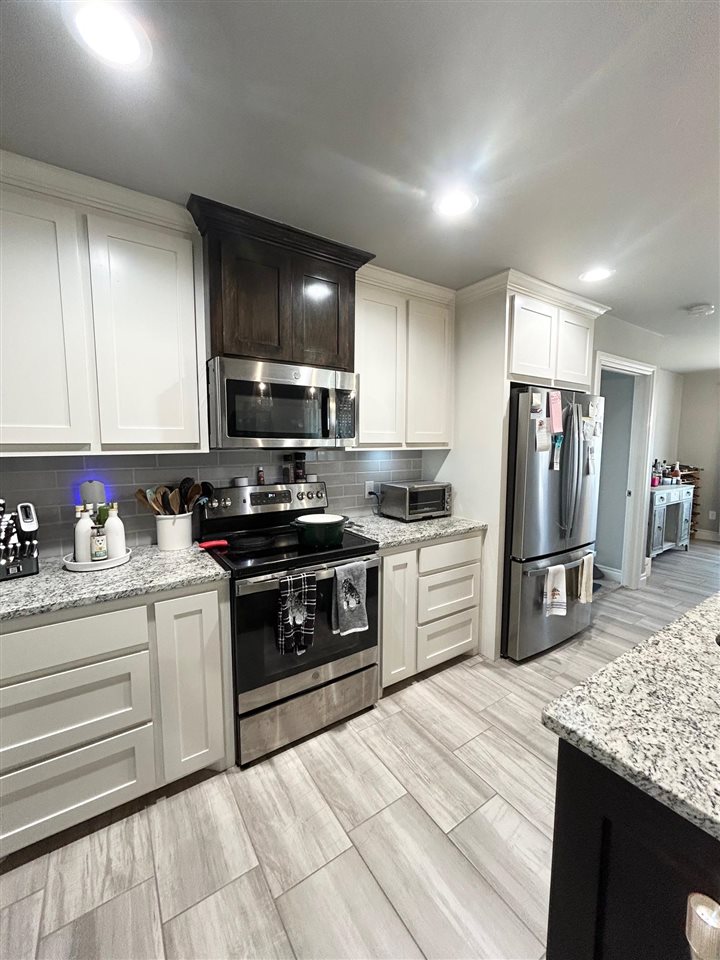 12366 NE Stone Ridge Ln.