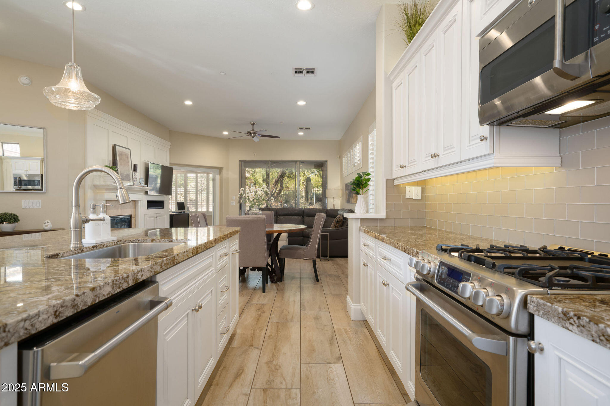 7722 E PEROLA Drive