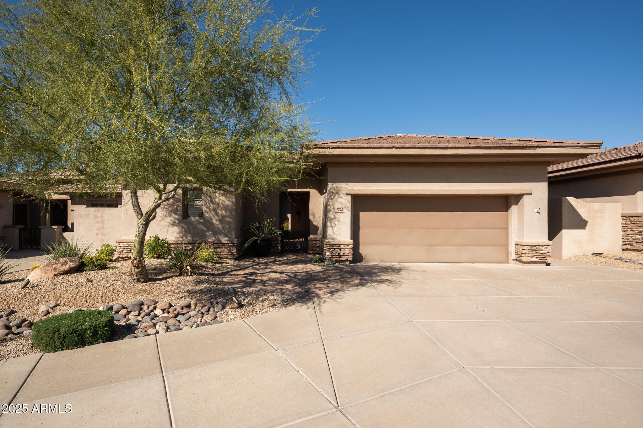 7722 E PEROLA Drive