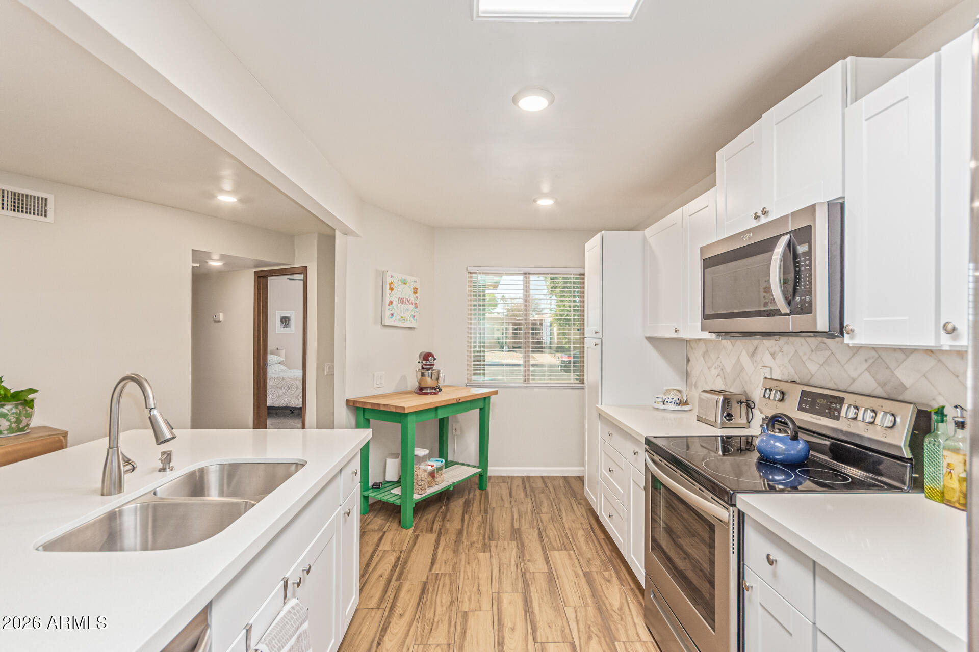 10902 W Topaz Drive