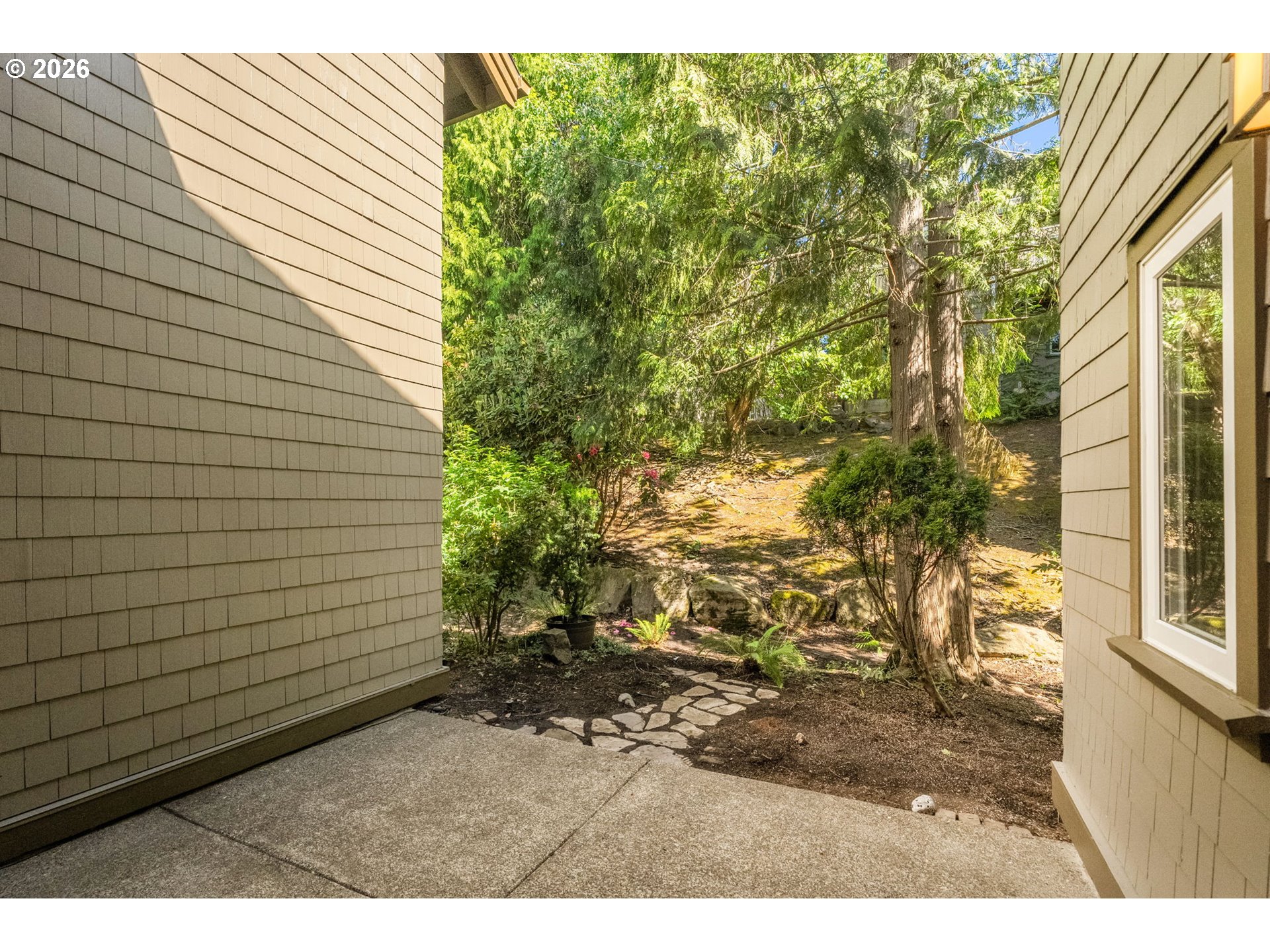 10209 NW VILLAGE HEIGHTS DR