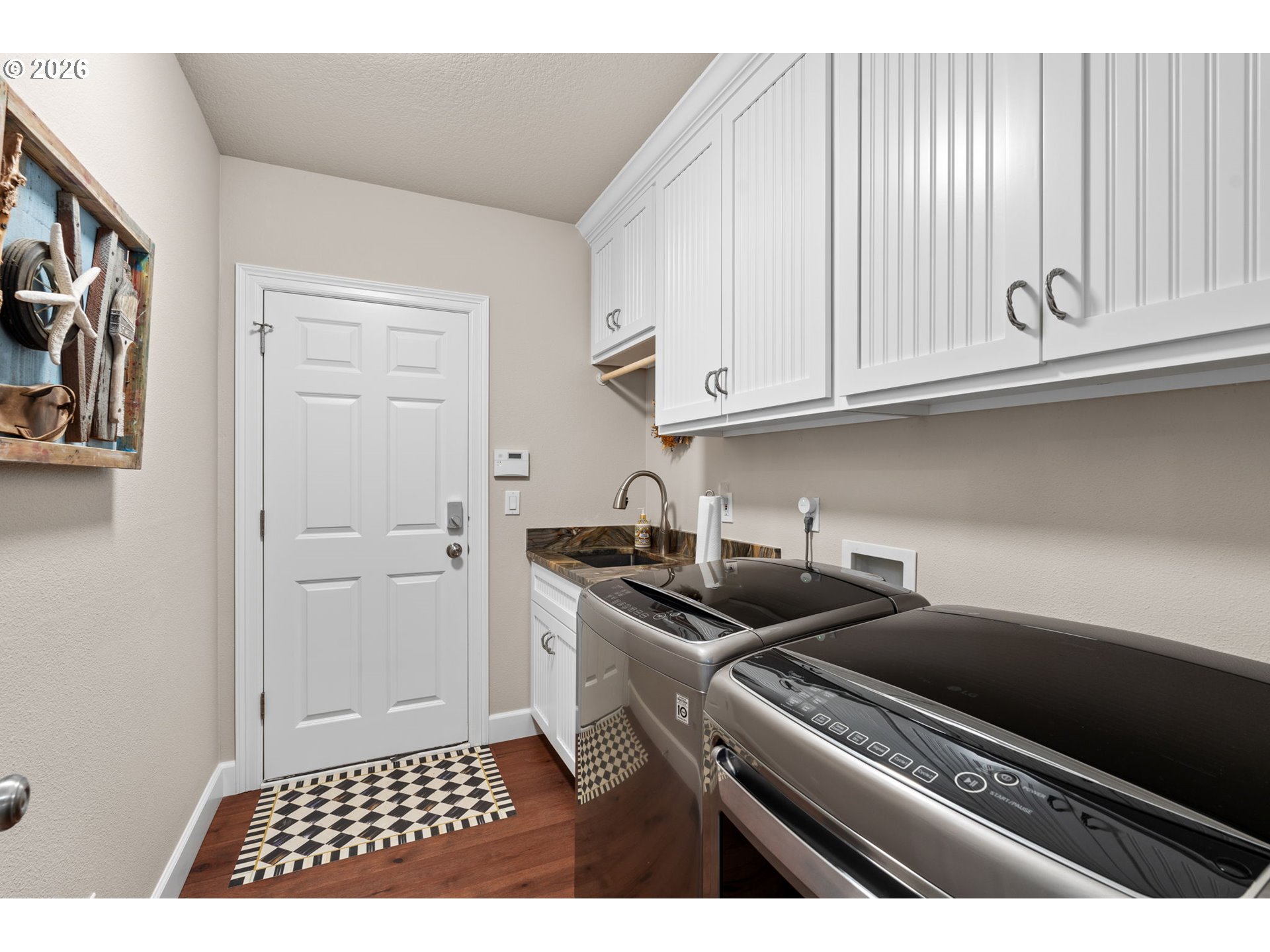 7717 NW BLUE POINTE LN