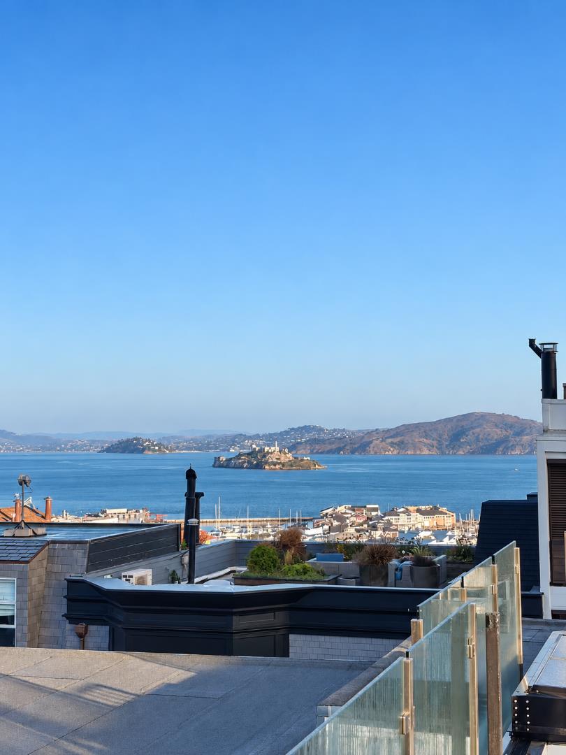 Rooftop terrace overlooking San Francisco Bay and Alcatraz Island.