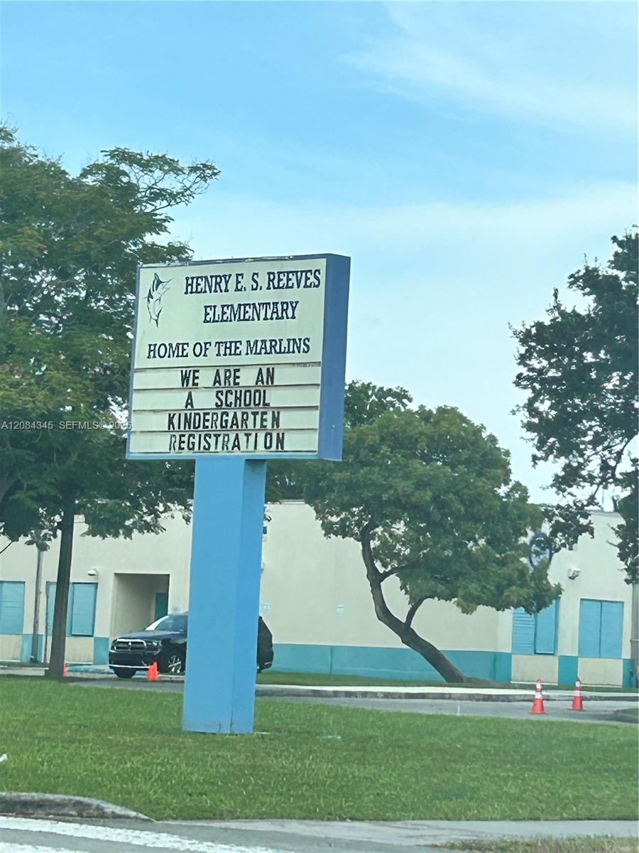Henry E. S. Reeves Elementary School sign in front of the school building.