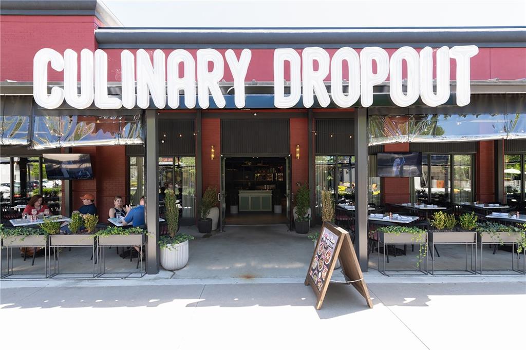 Culinary Dropout restaurant entrance with outdoor patio seating.