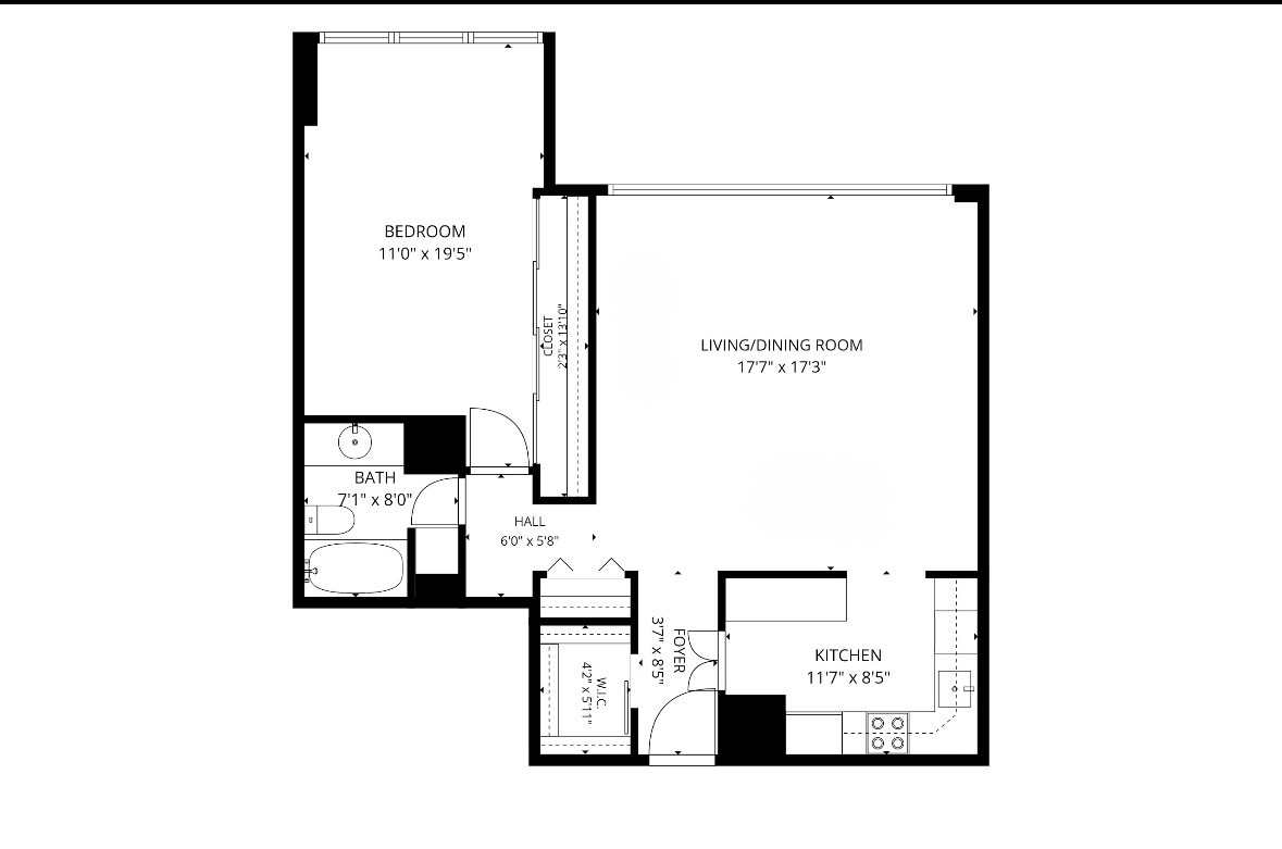 Apartment floor plan with one bedroom, living/dining room, kitchen, bathroom, and walk-in closet.