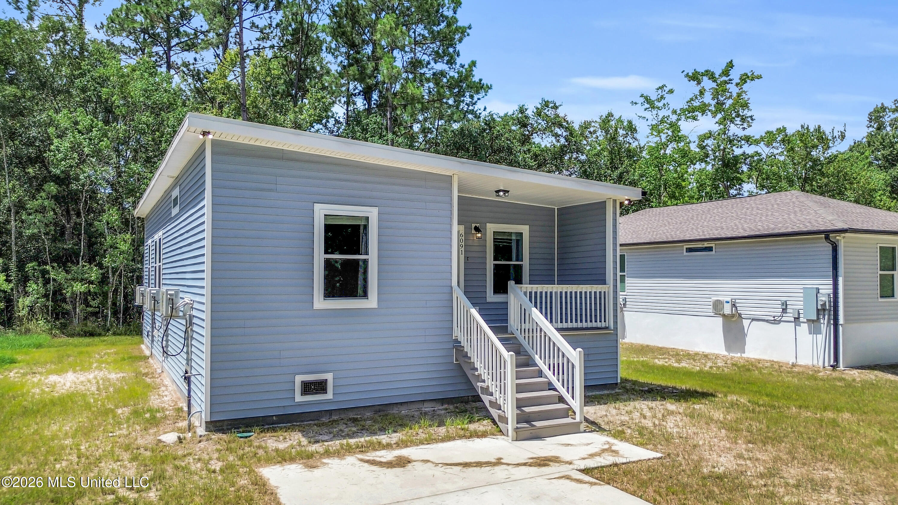 6091 E Adams