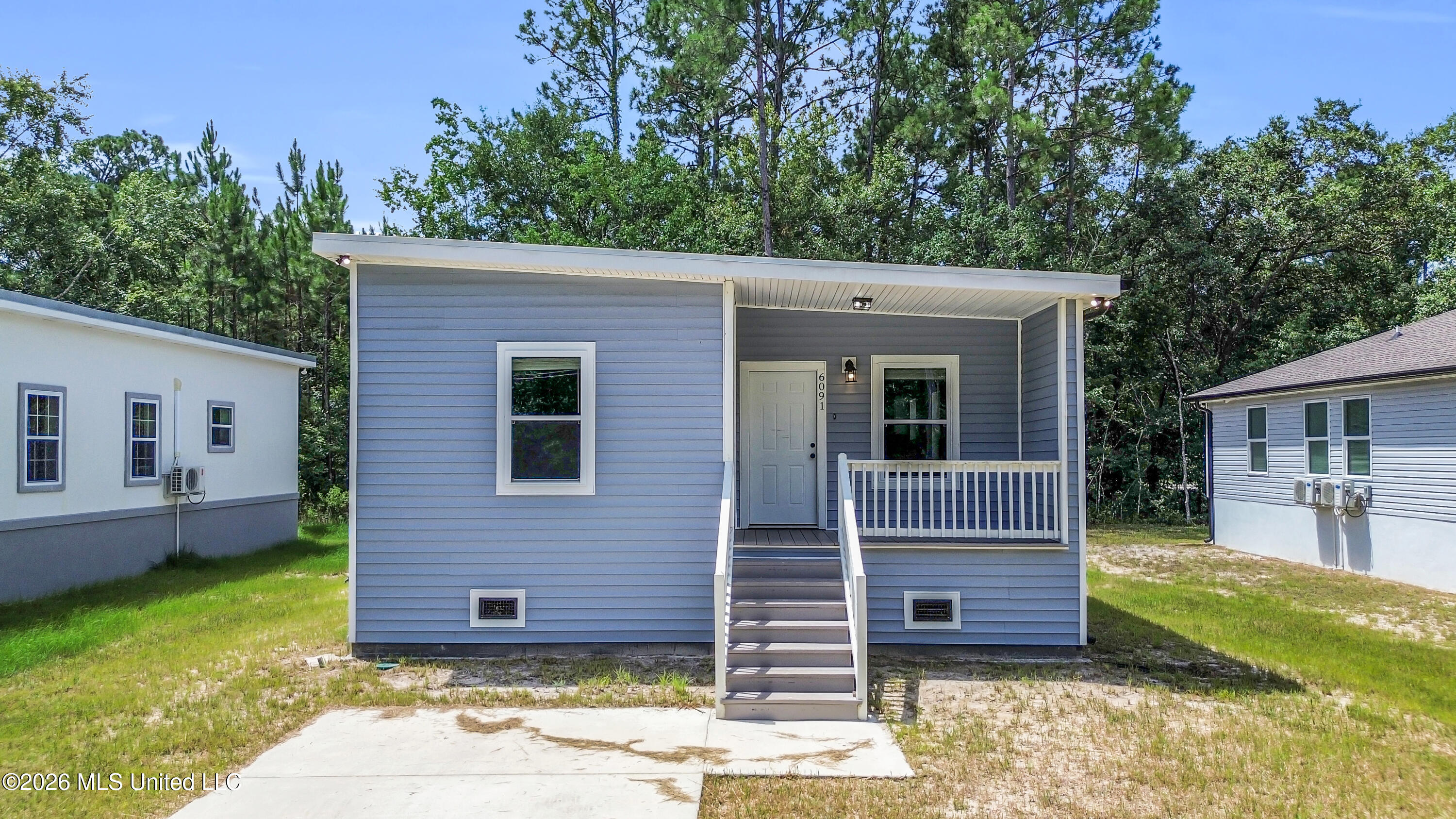 6091 E Adams