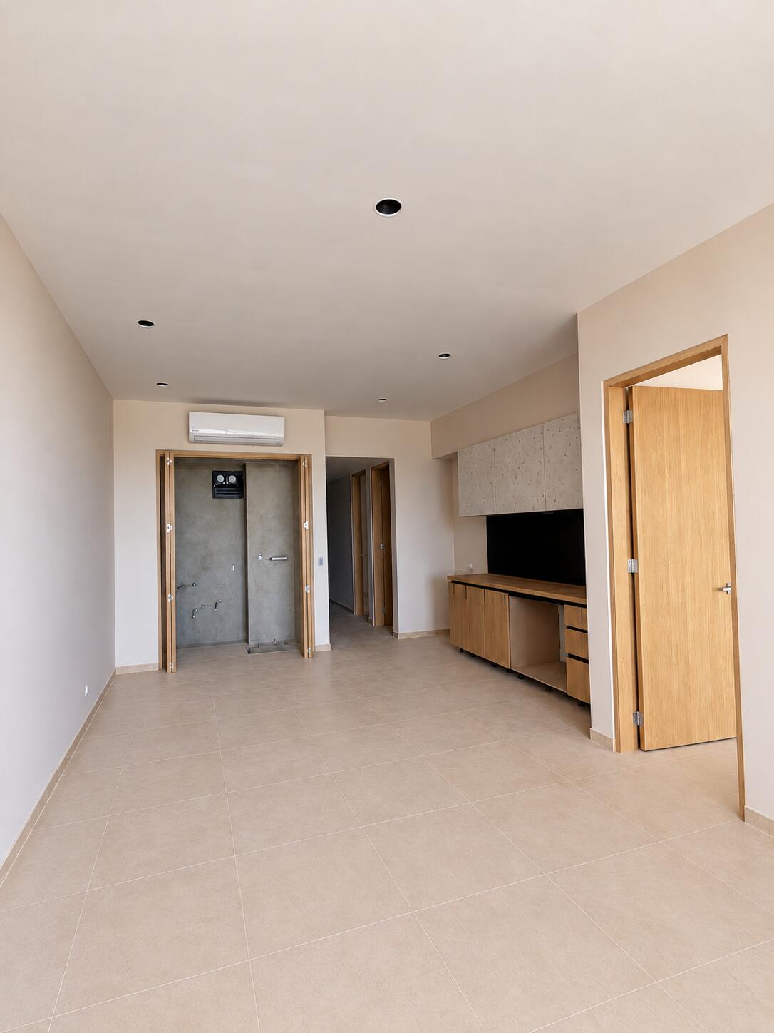 Unfurnished modern bathroom with a walk-in shower and wood vanity.