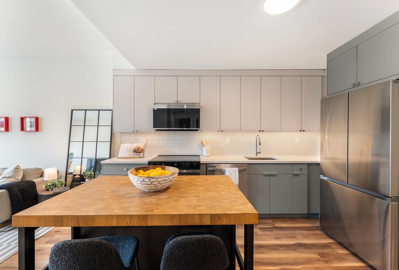 857 COMMUNIPAW AVE Unit: 413