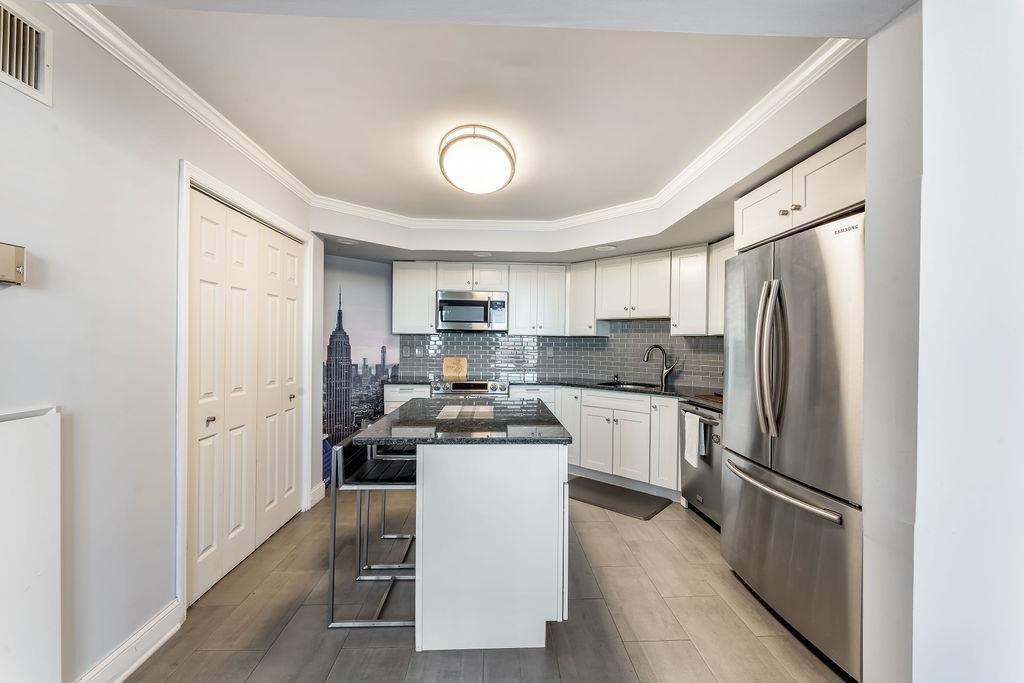 2110 HARMON COVE TOWER