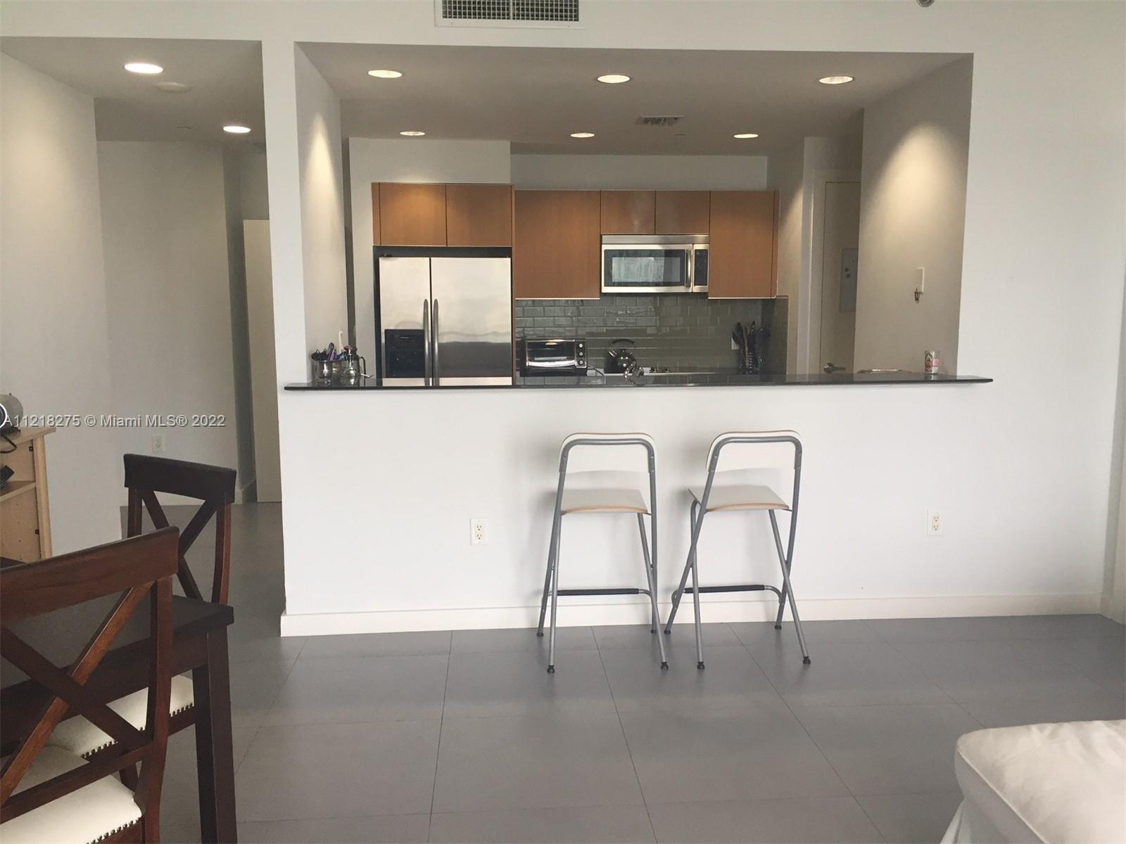 1050 BRICKELL AV # 2002